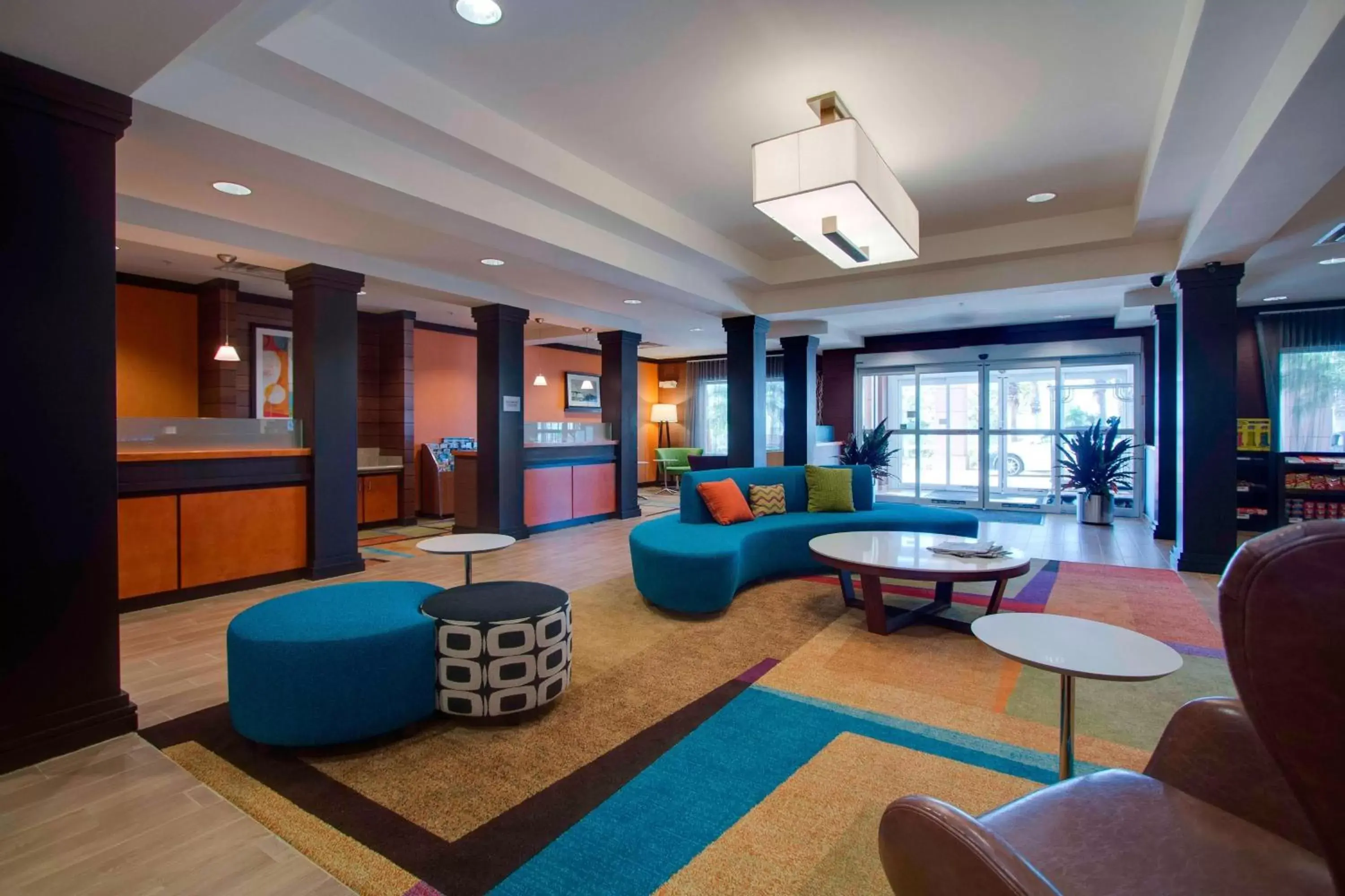 Lobby or reception, Lounge/Bar in Fairfield Inn & Suites by Marriott Clermont