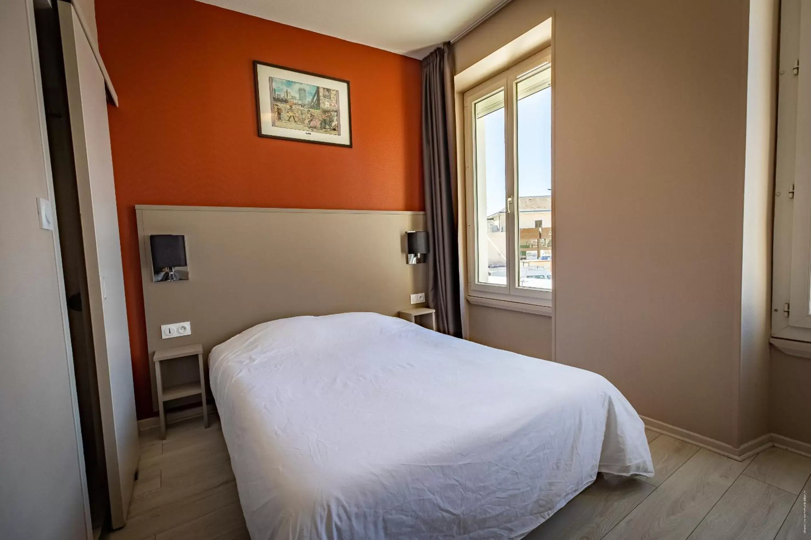 Bed in Hotel de la Gare