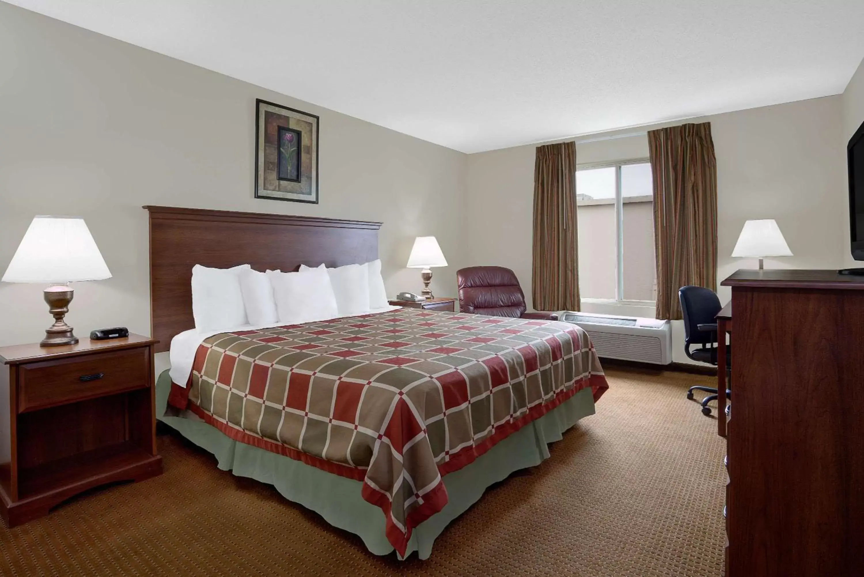 Photo of the whole room, Bed in Days Inn by Wyndham Greensboro NC