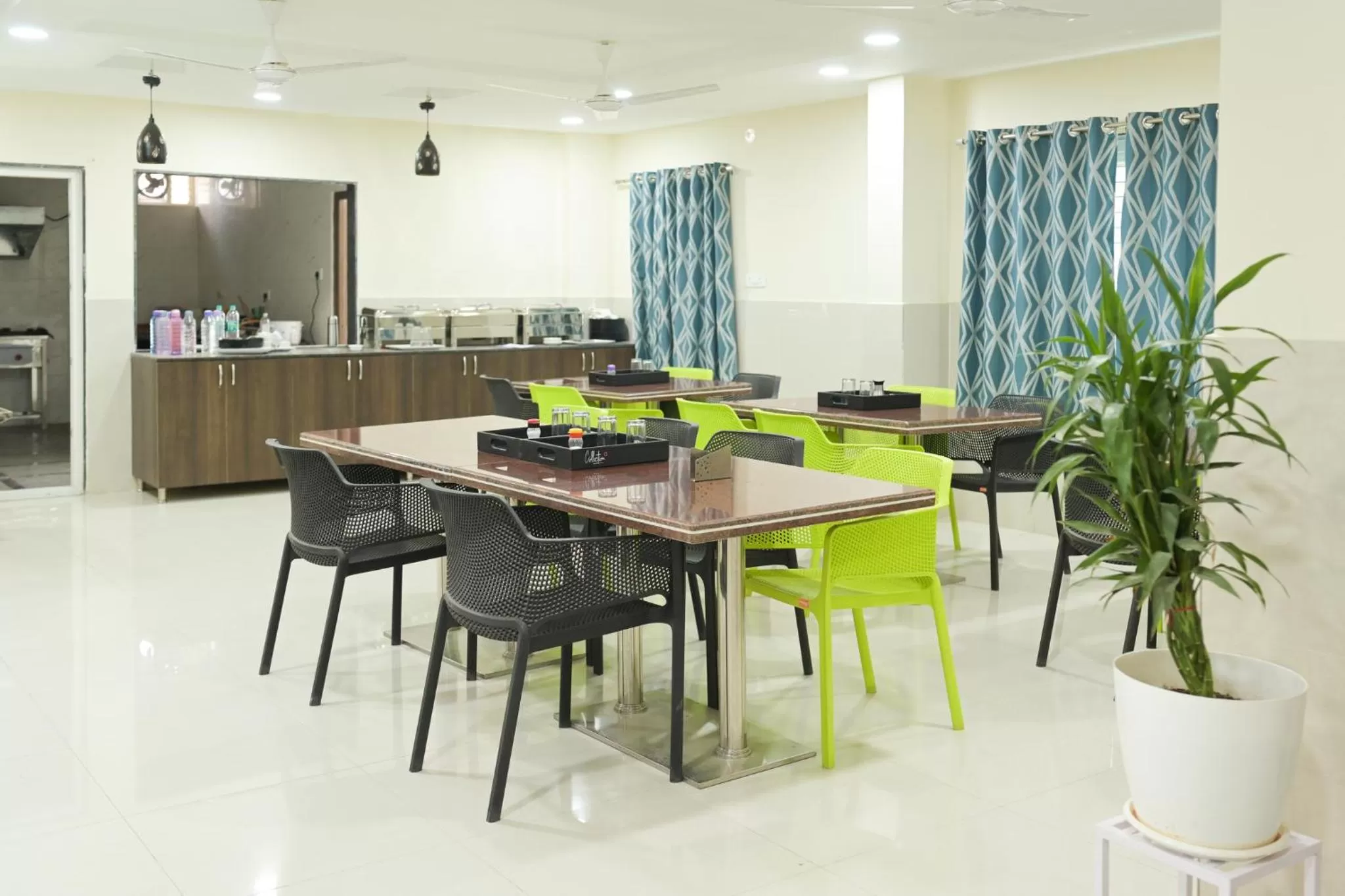 Dining area in Hotel Voila Atnest Suites Kokapet, Business Hotel