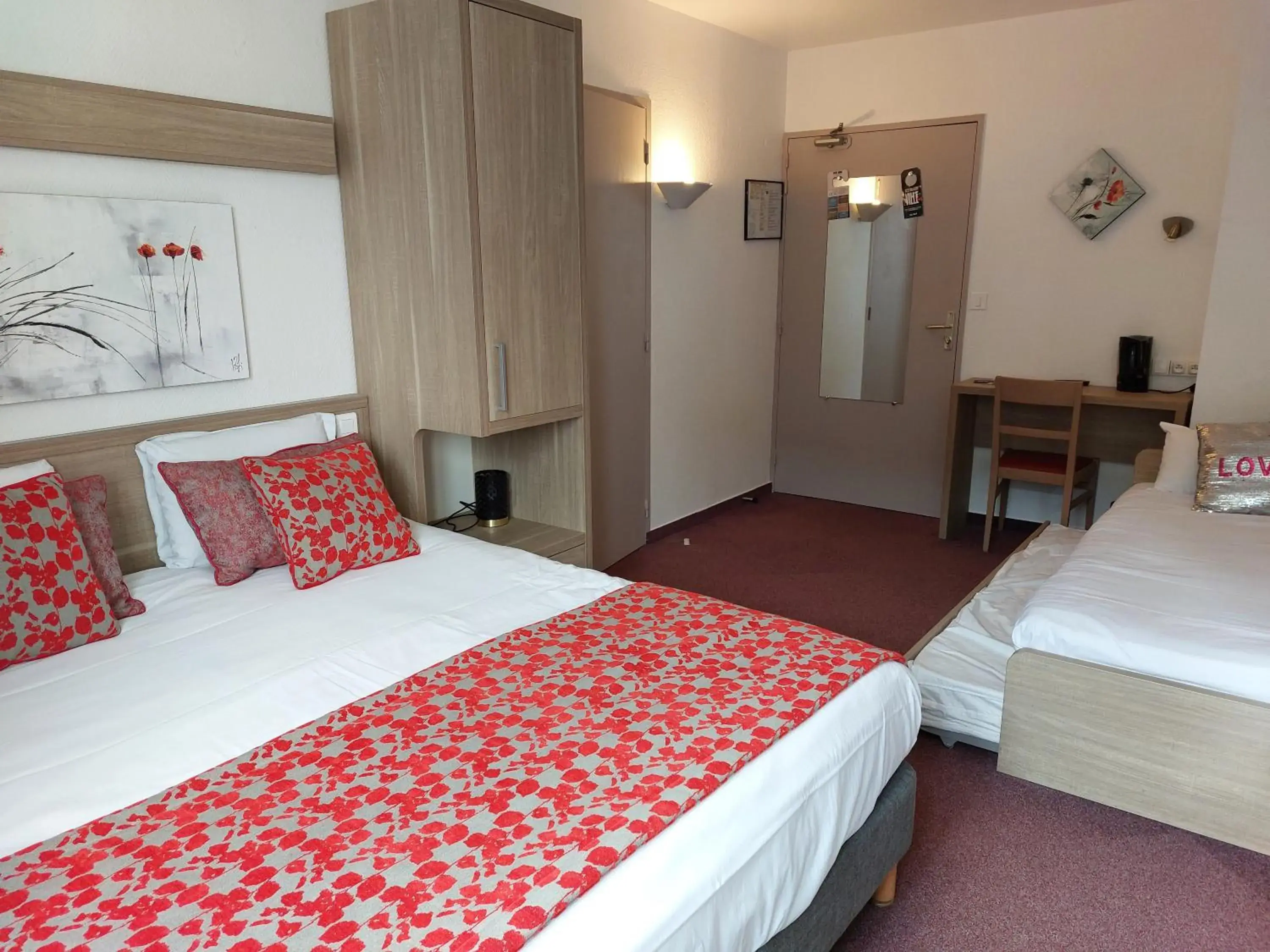 Bed in Kyriad Hotel - Restaurant Carentan