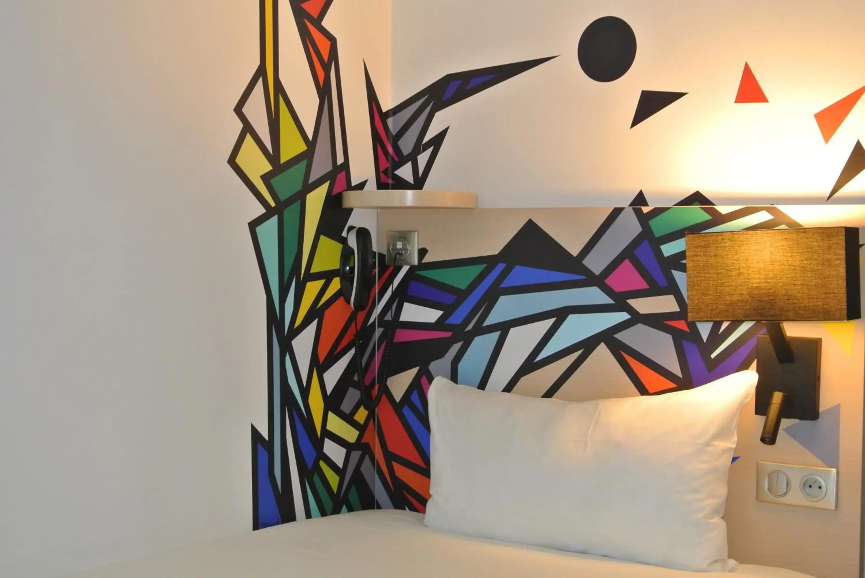 Decorative detail, Bed in Ibis Styles Paris Maine Montparnasse