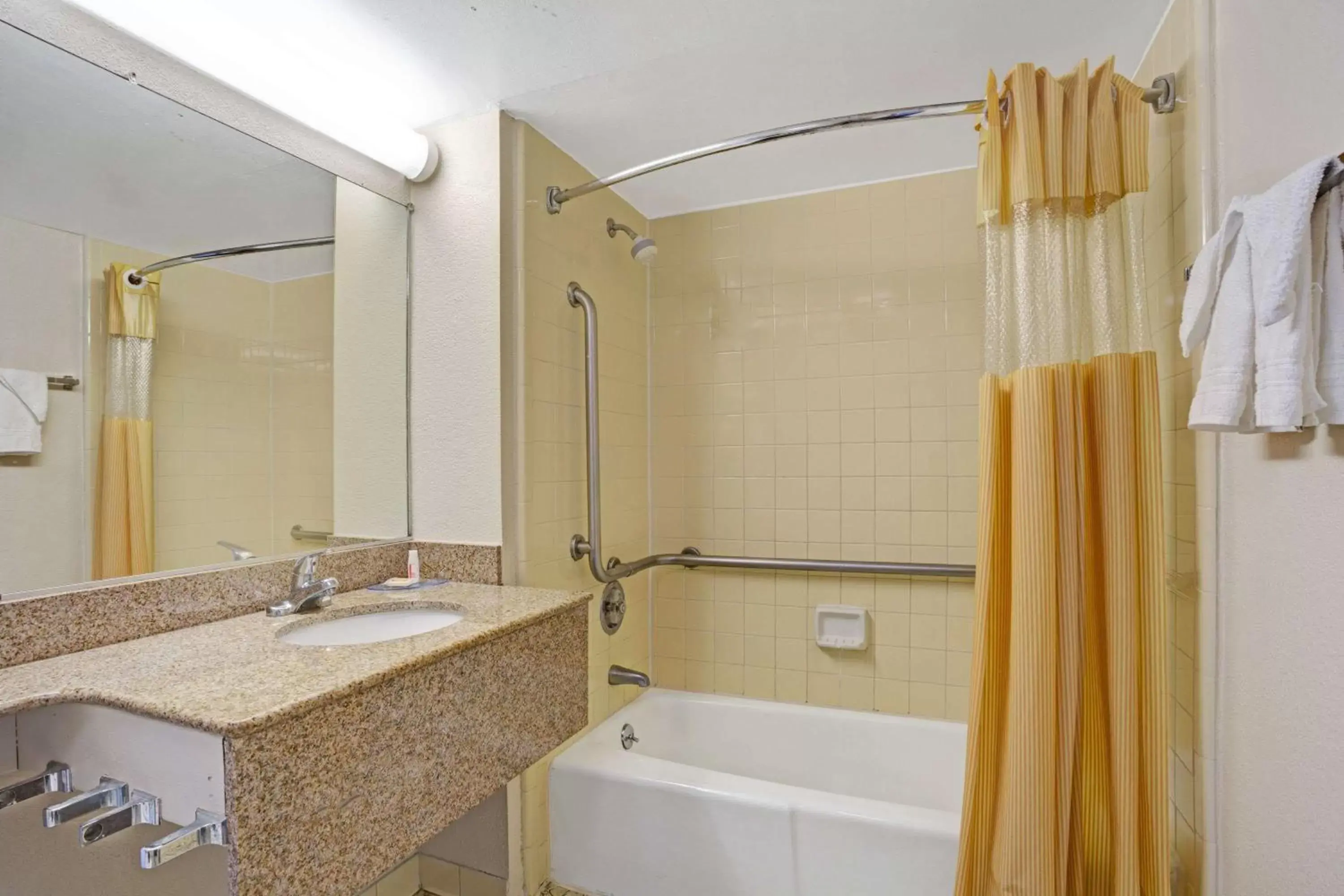 Bathroom in Days Inn by Wyndham Norfolk Military Circle