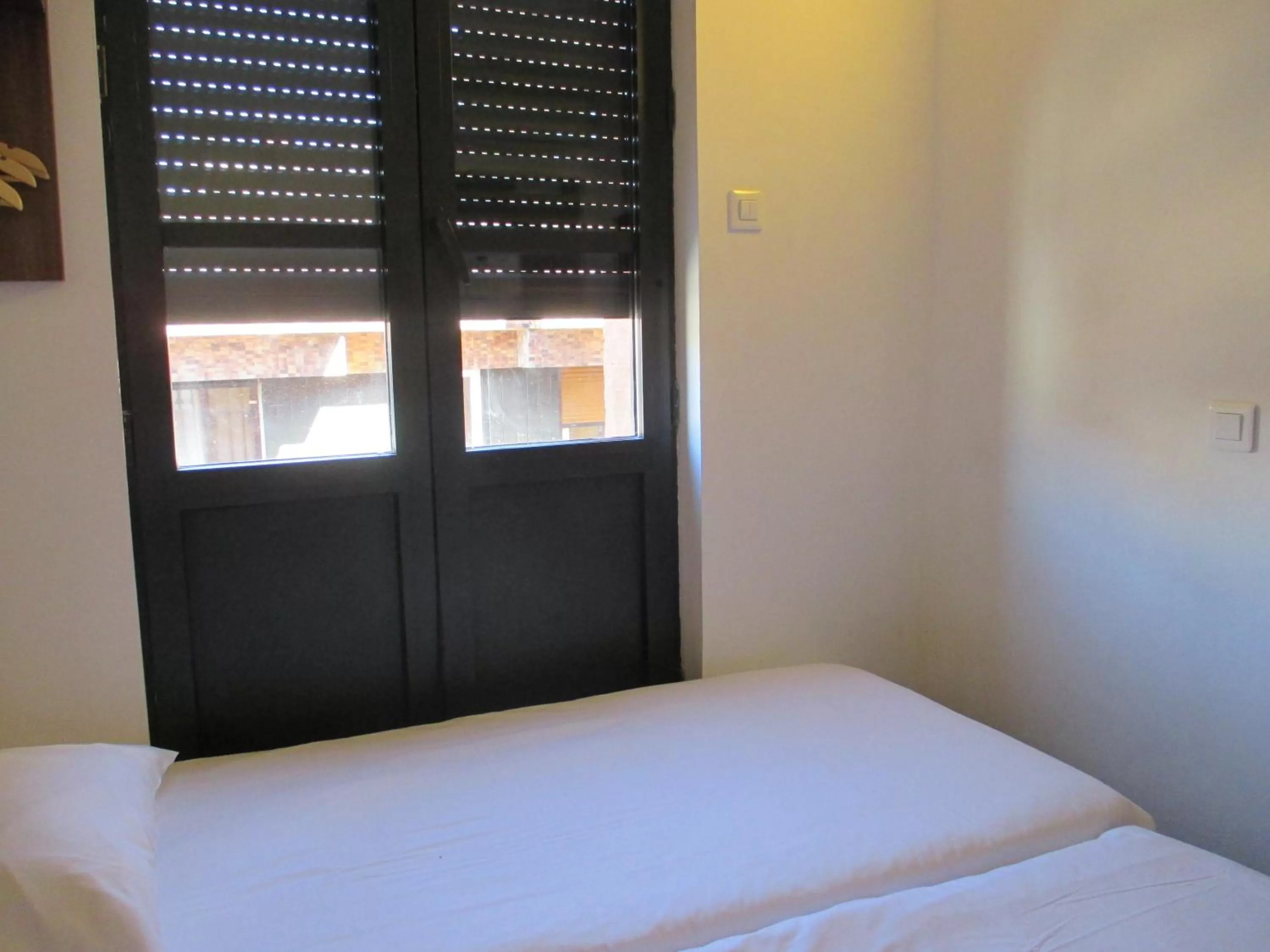 Bedroom, Bed in Hôtel le Pastel