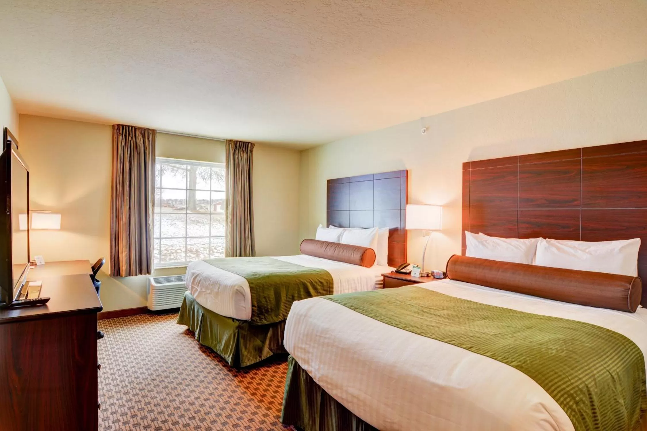 Bedroom in Cobblestone Hotel & Suites - Punxsutawney