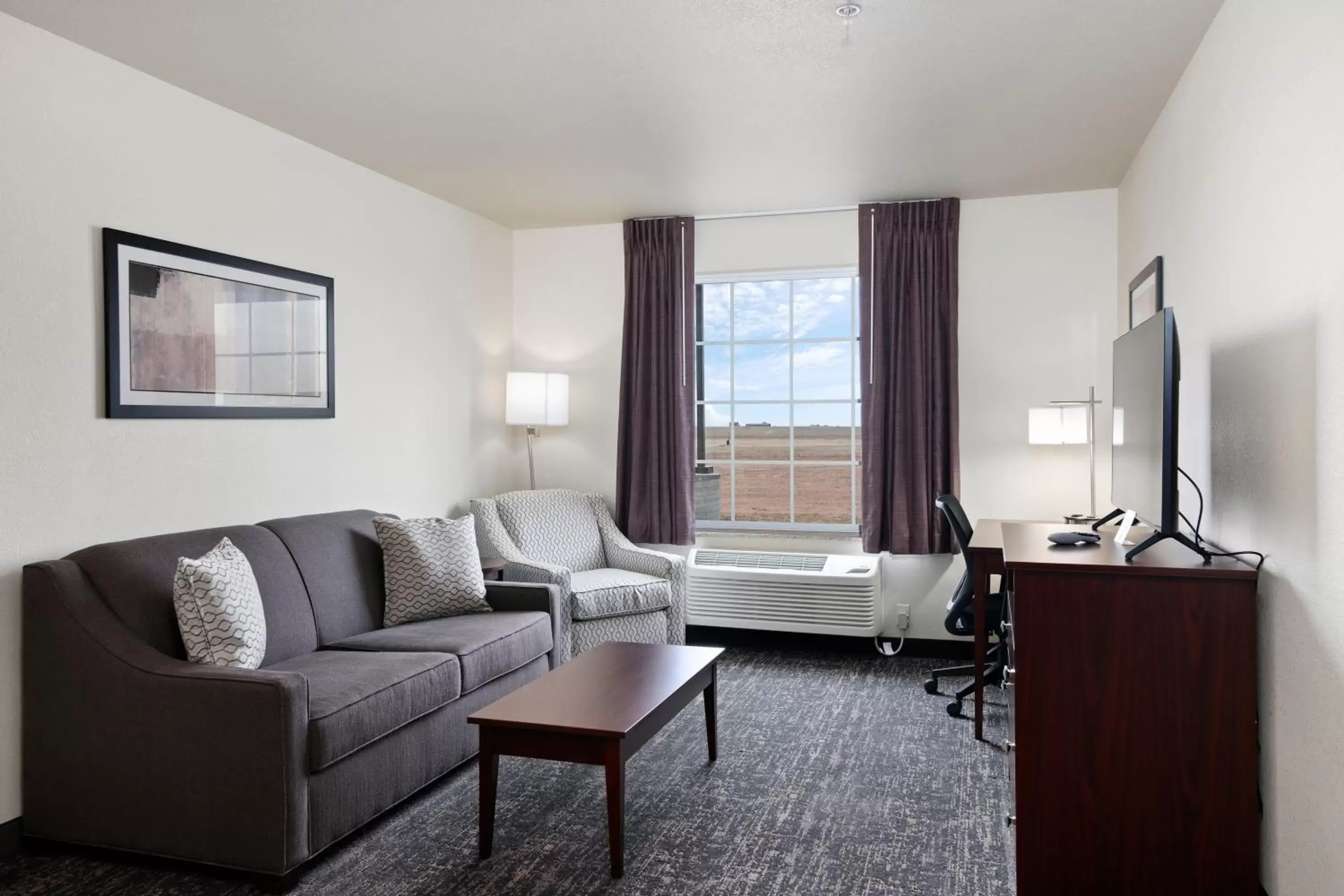 Living room, Seating Area in Cobblestone Inn & Suites - Yuma