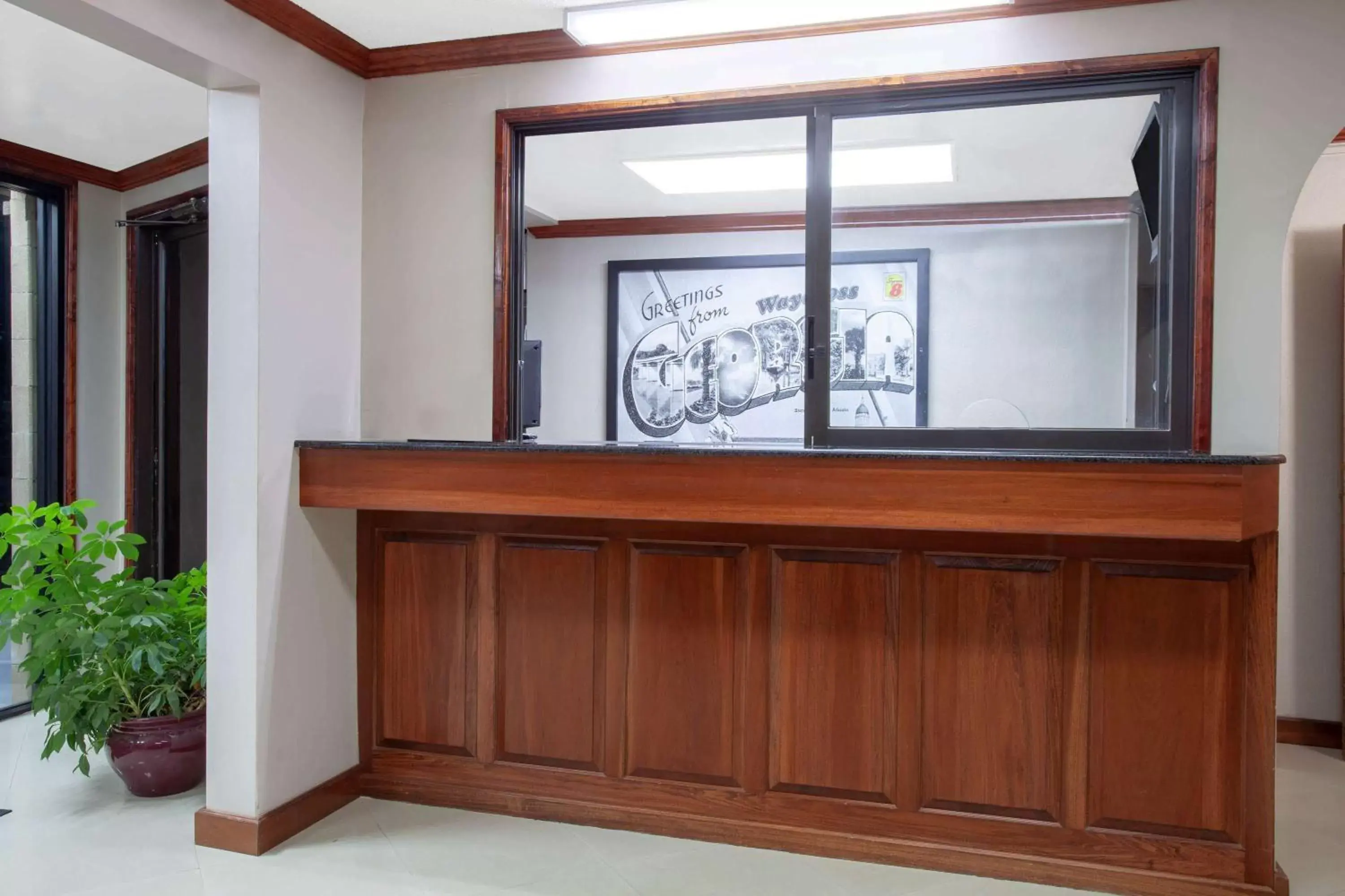 Lobby or reception in Super 8 by Wyndham Waycross GA Lobby or reception in Super 8 by Wyndham Waycross GA