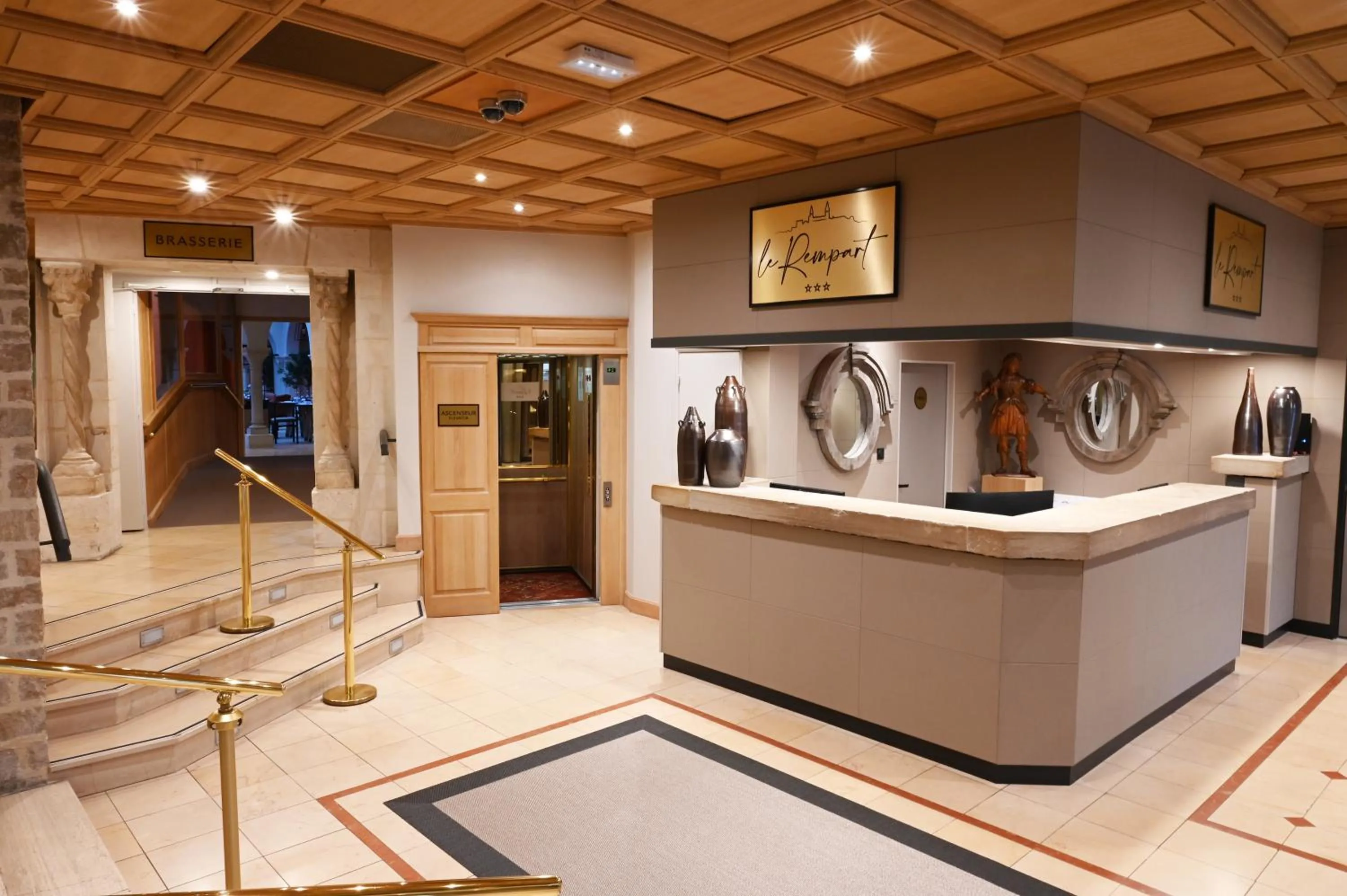 Lobby or reception in Hôtel Le Rempart
