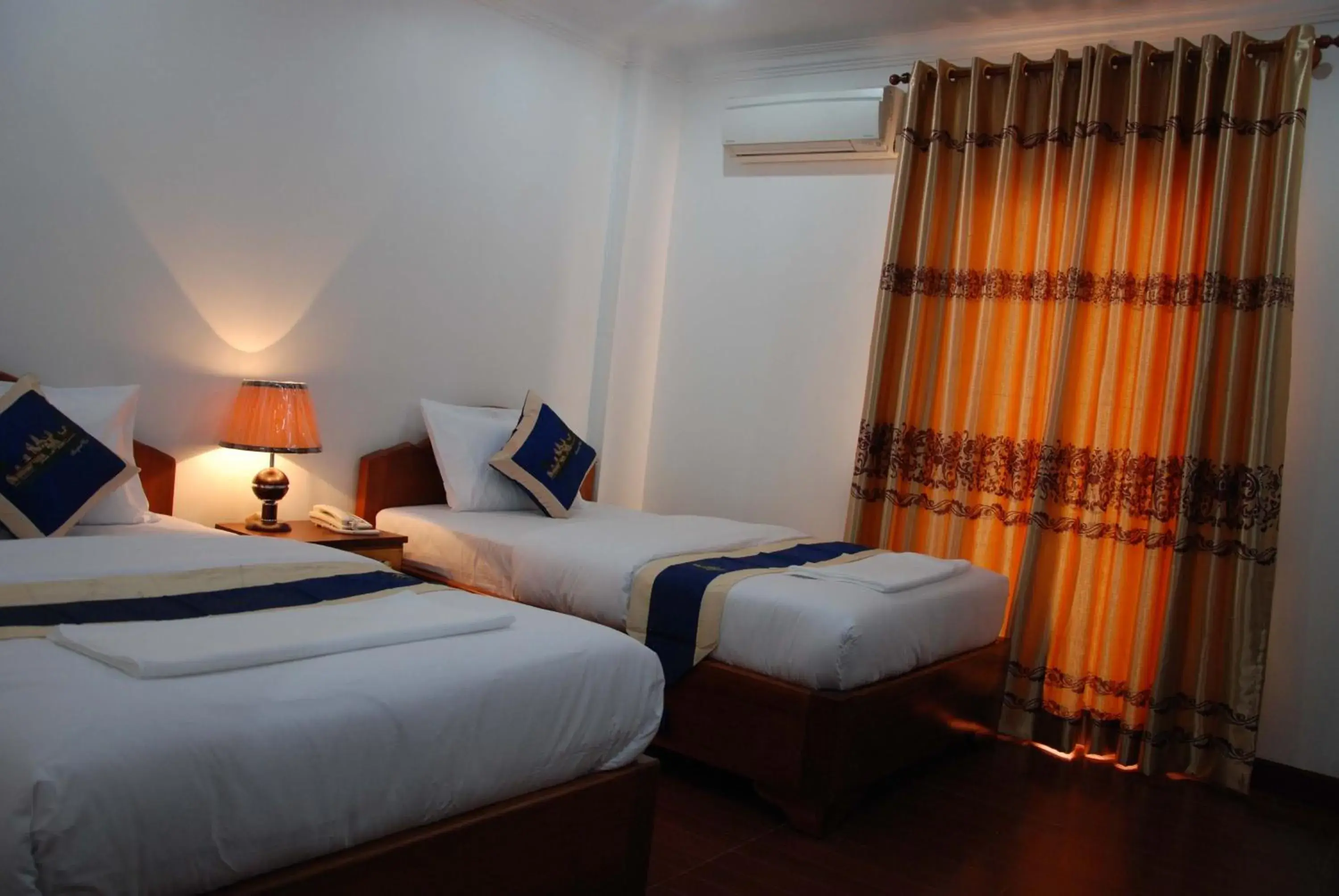 Decorative detail, Bed in Emerald BB Battambang Hotel Decorative detail, Bed in Emerald BB Battambang Hotel