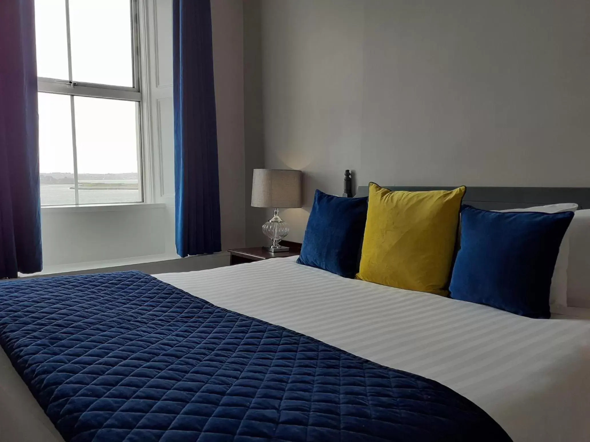 Bed in Commodore Hotel
