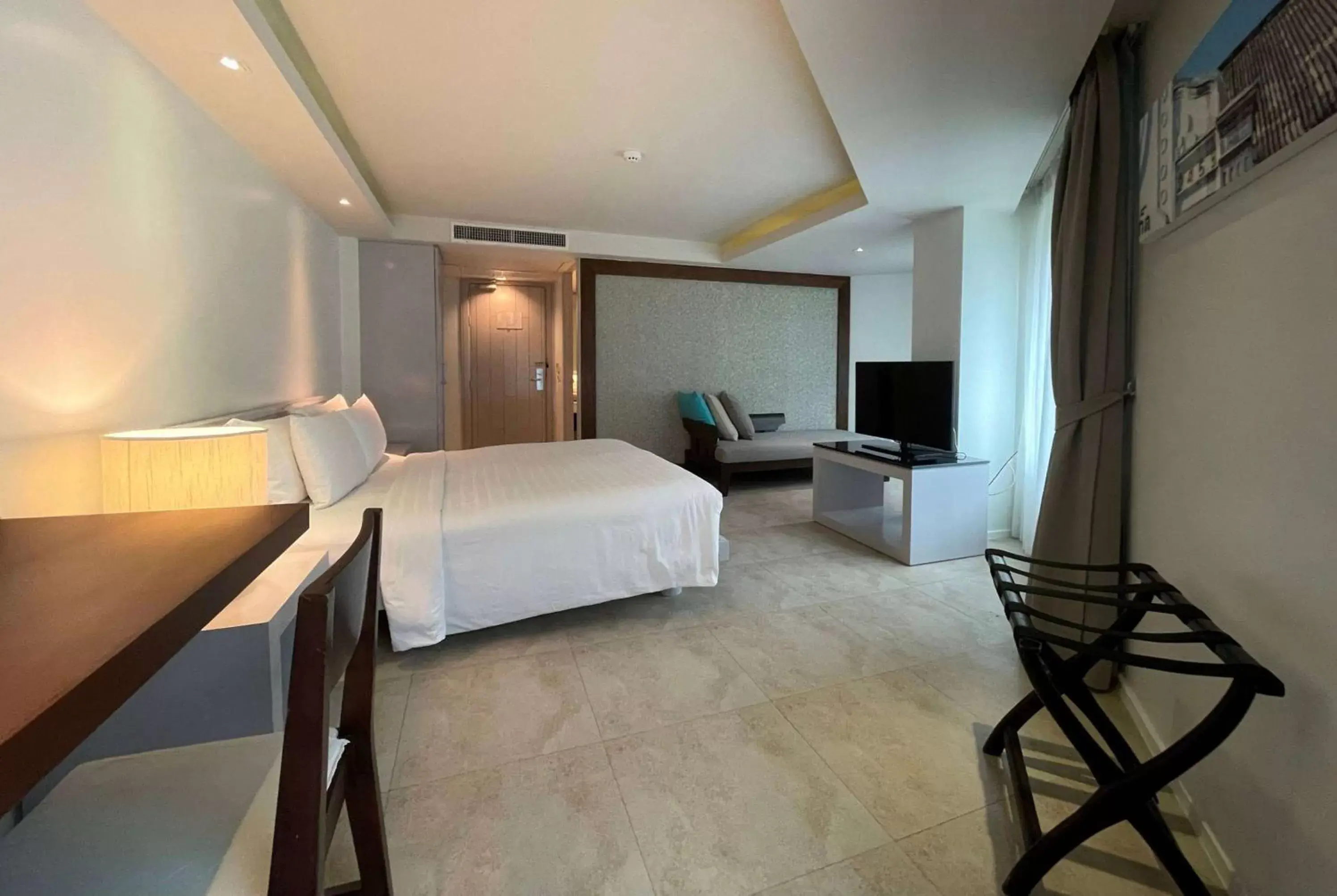 Photo of the whole room in Zenmaya Oceanfront Phuket, Trademark Collection by Wyndham