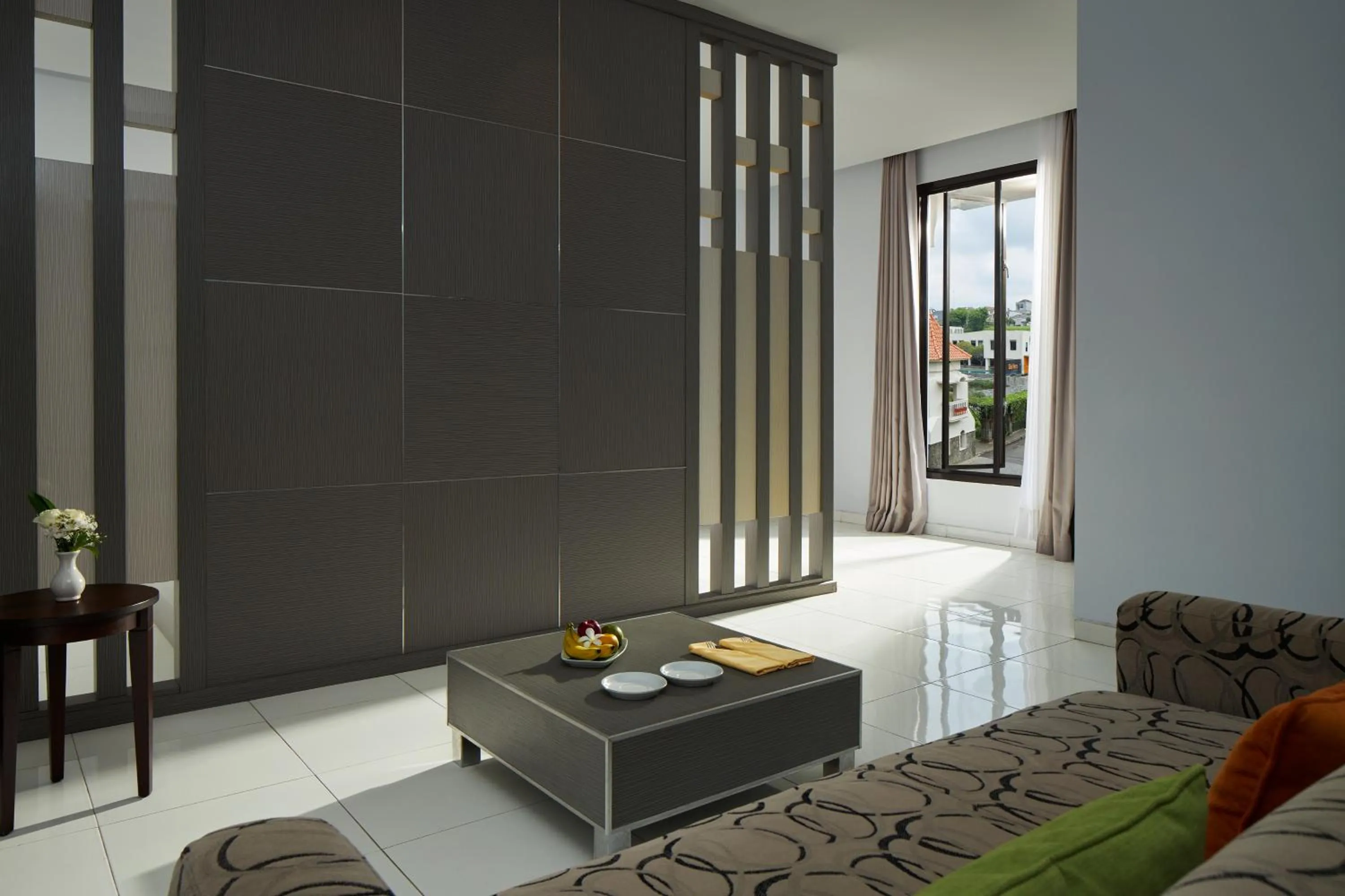 Living room, Bed in eL Hotel Malang