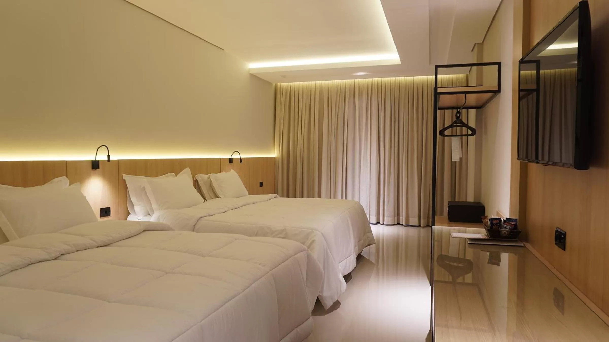 Bed in Rafain Palace Hotel & Convention Center