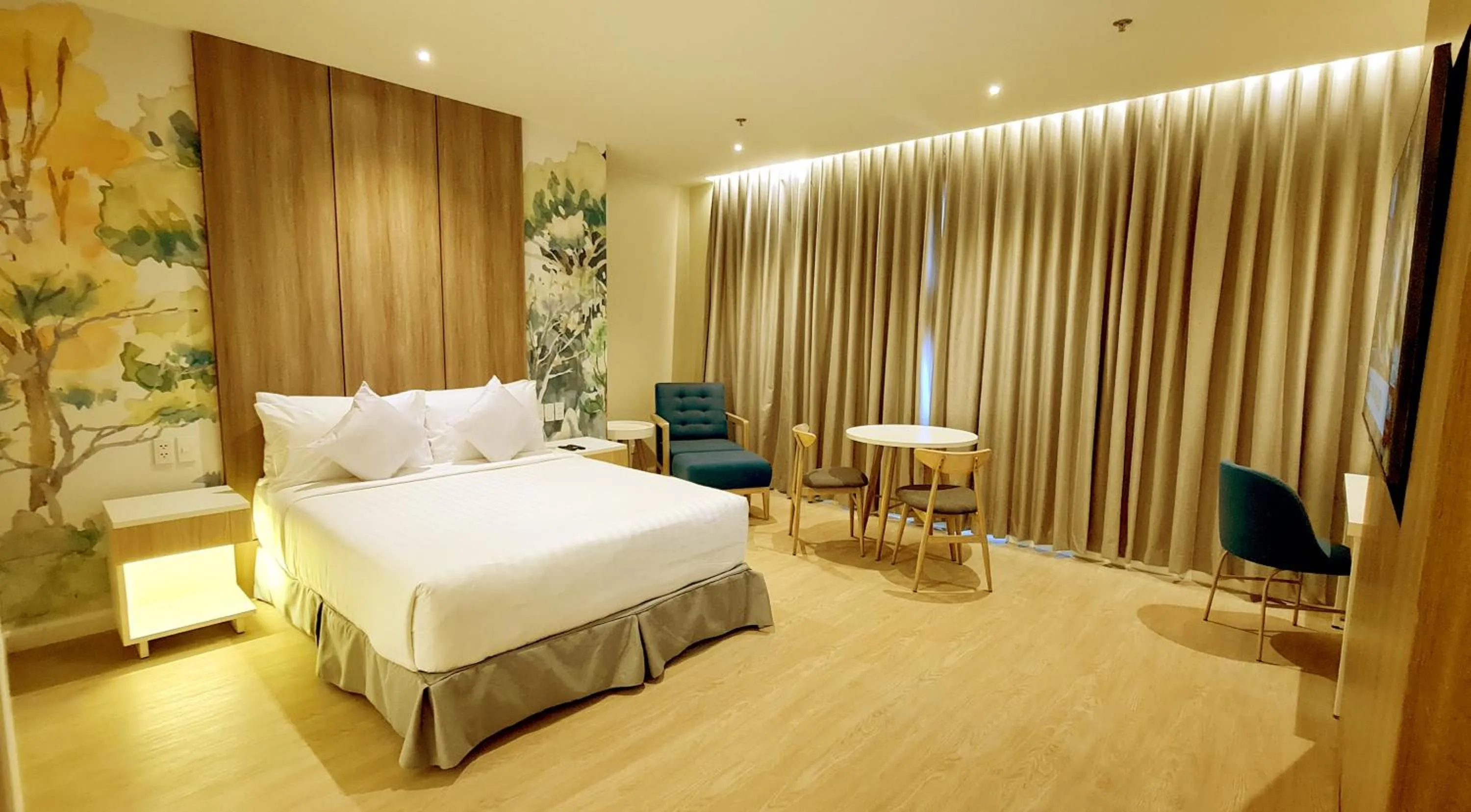 Bed in Harolds Hotel Quezon City