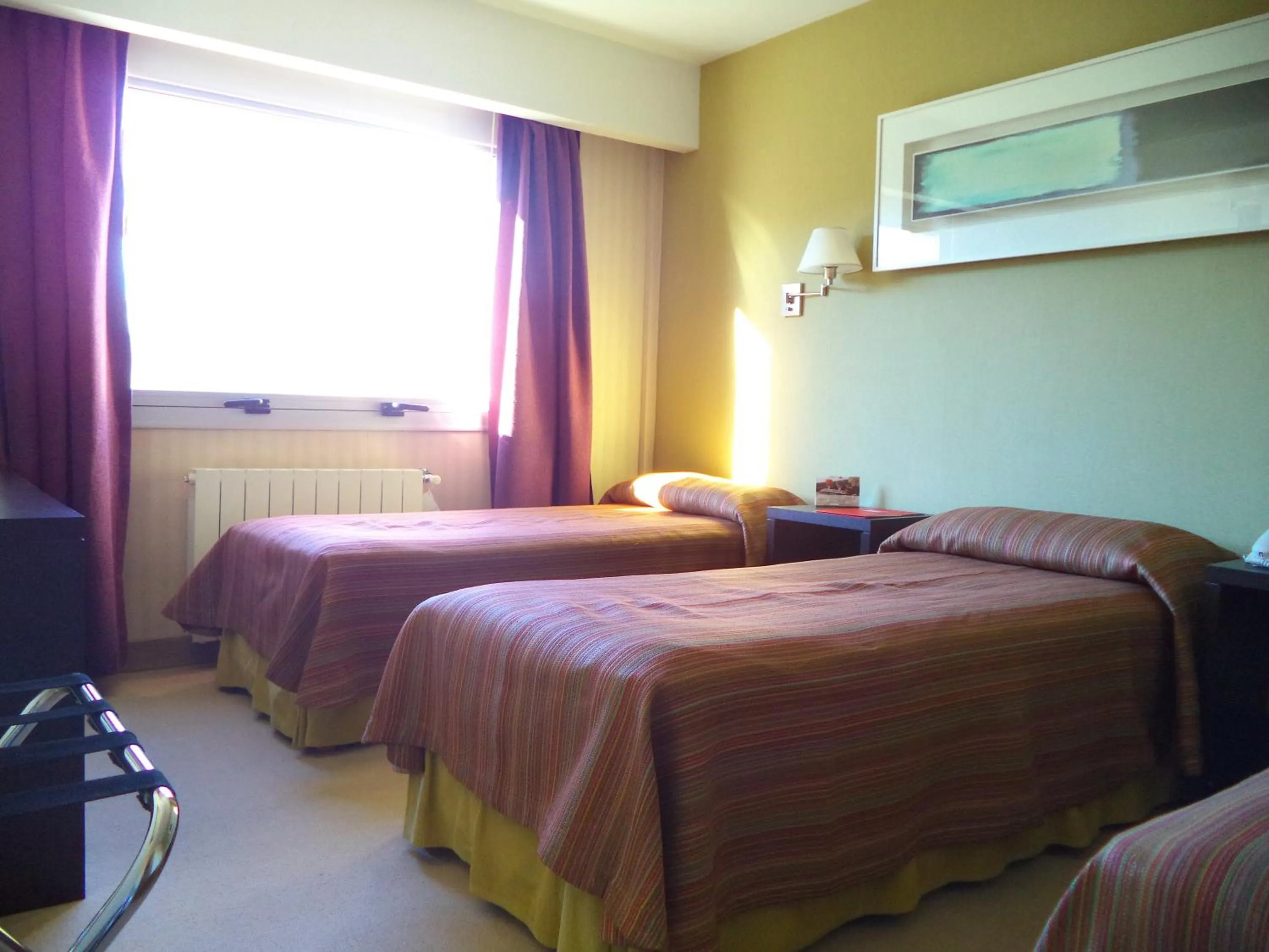 Photo of the whole room, Bed in MIL810 Ushuaia Hotel