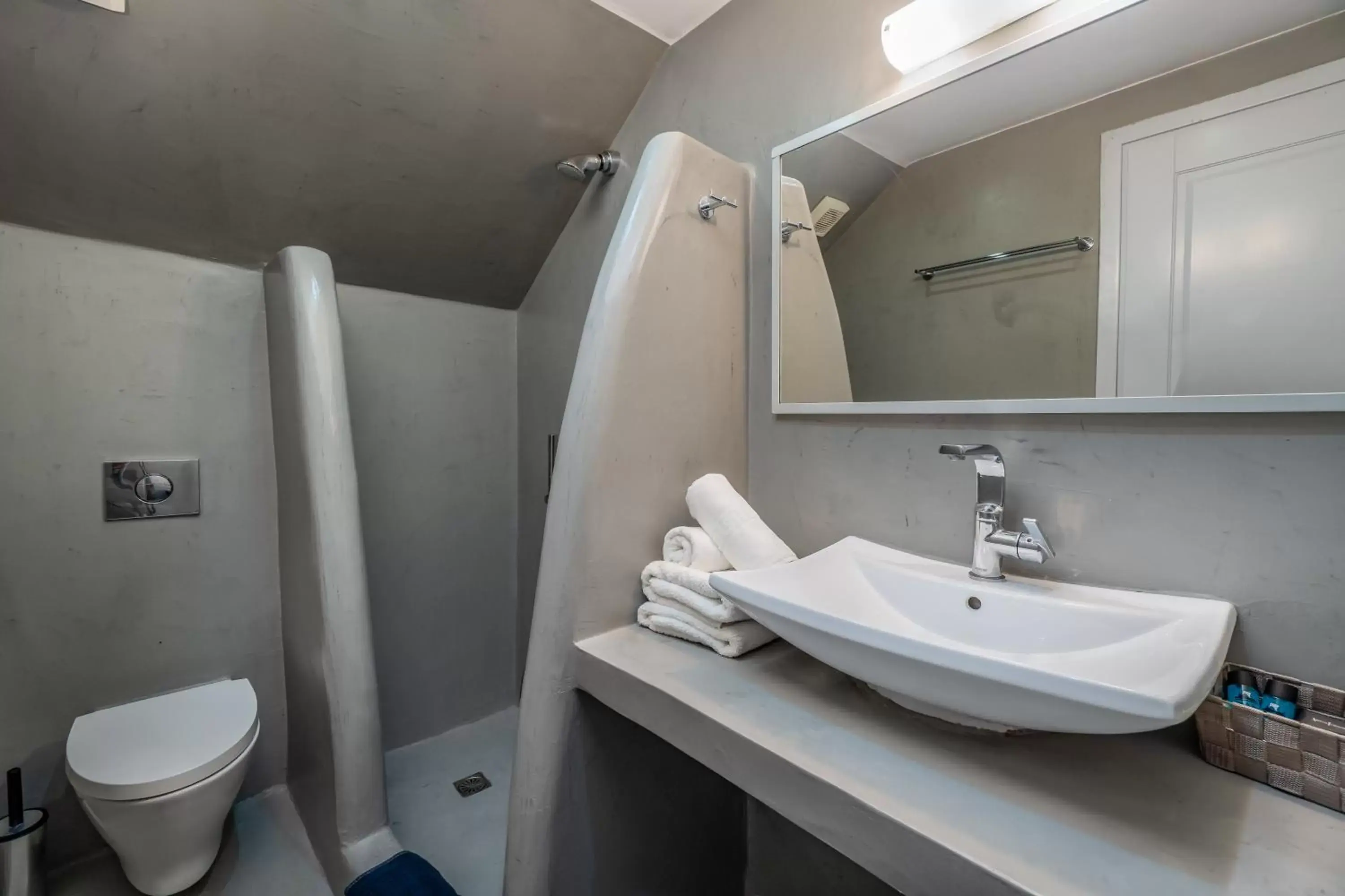 Bathroom in Central Fira Suites