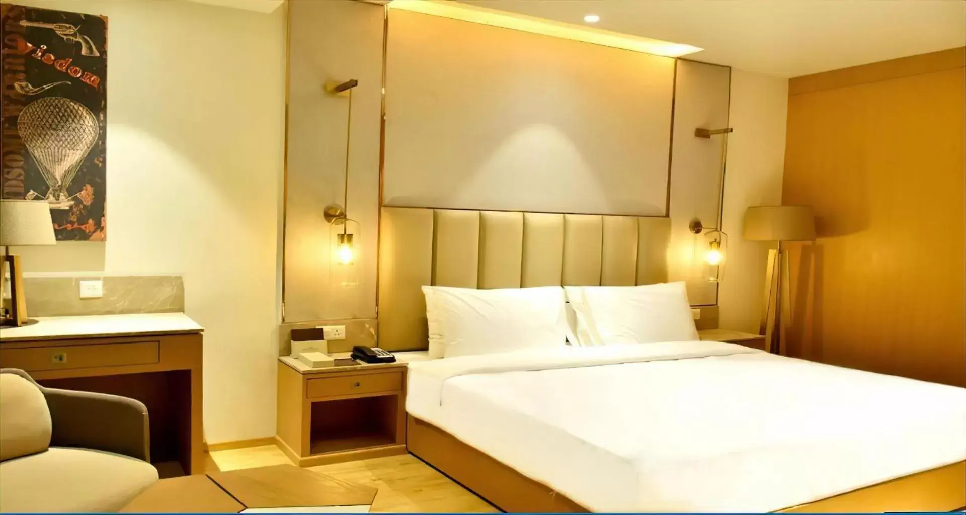 Bed in Sarovar Portico Morbi