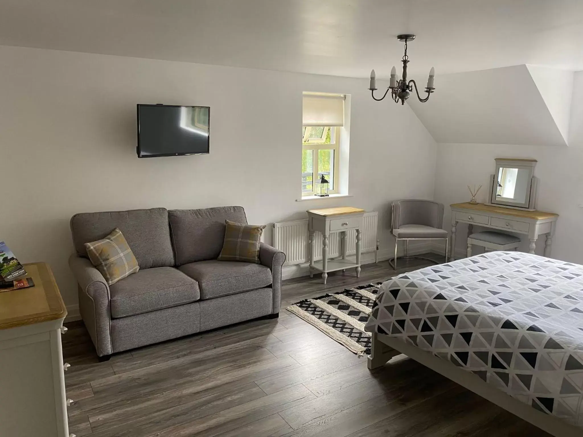 Bedroom, Seating Area in Rostrevor Valley Holiday Park Rooms with Hot tub and car service