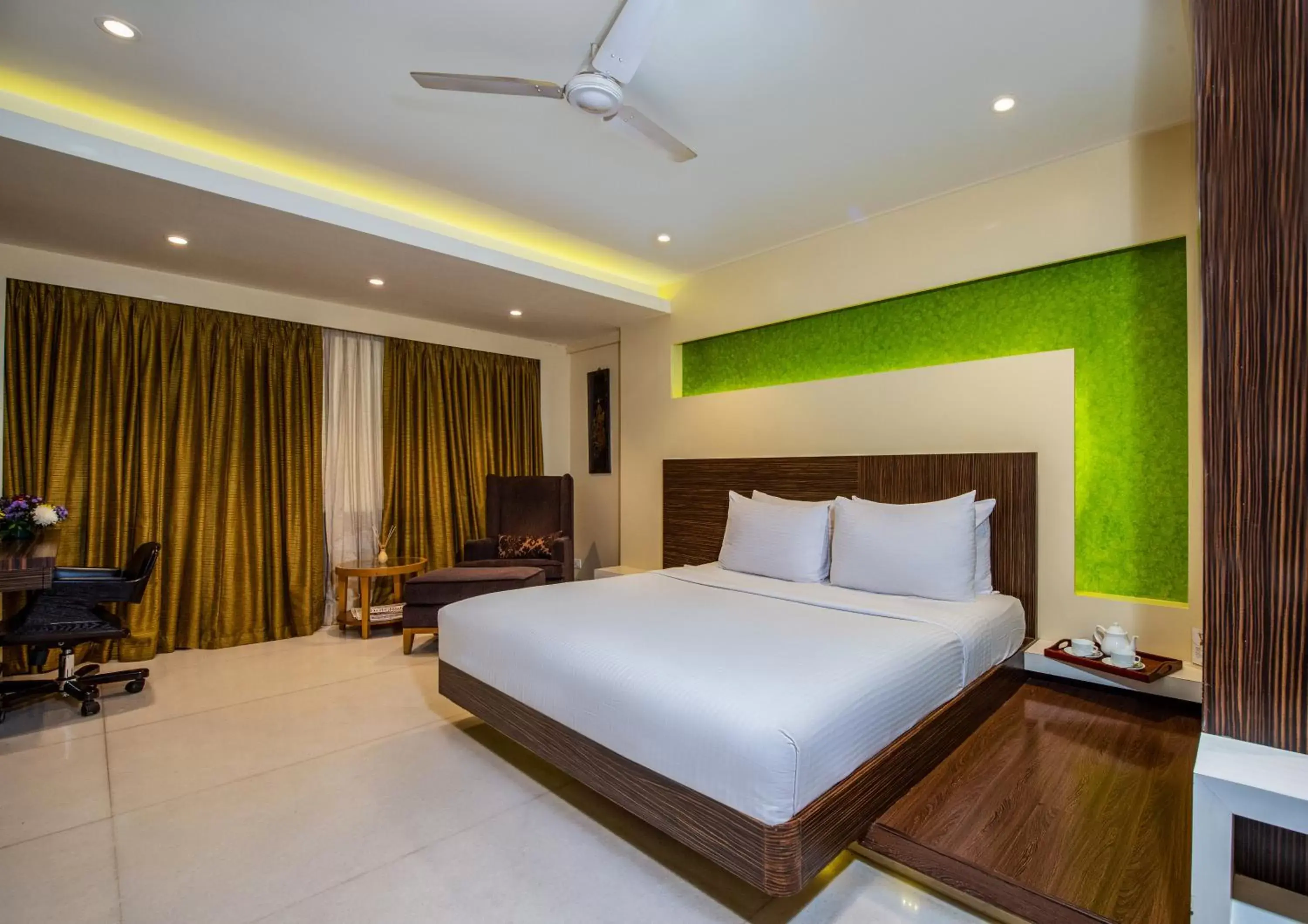 Bed in Hotel Bawa Suites