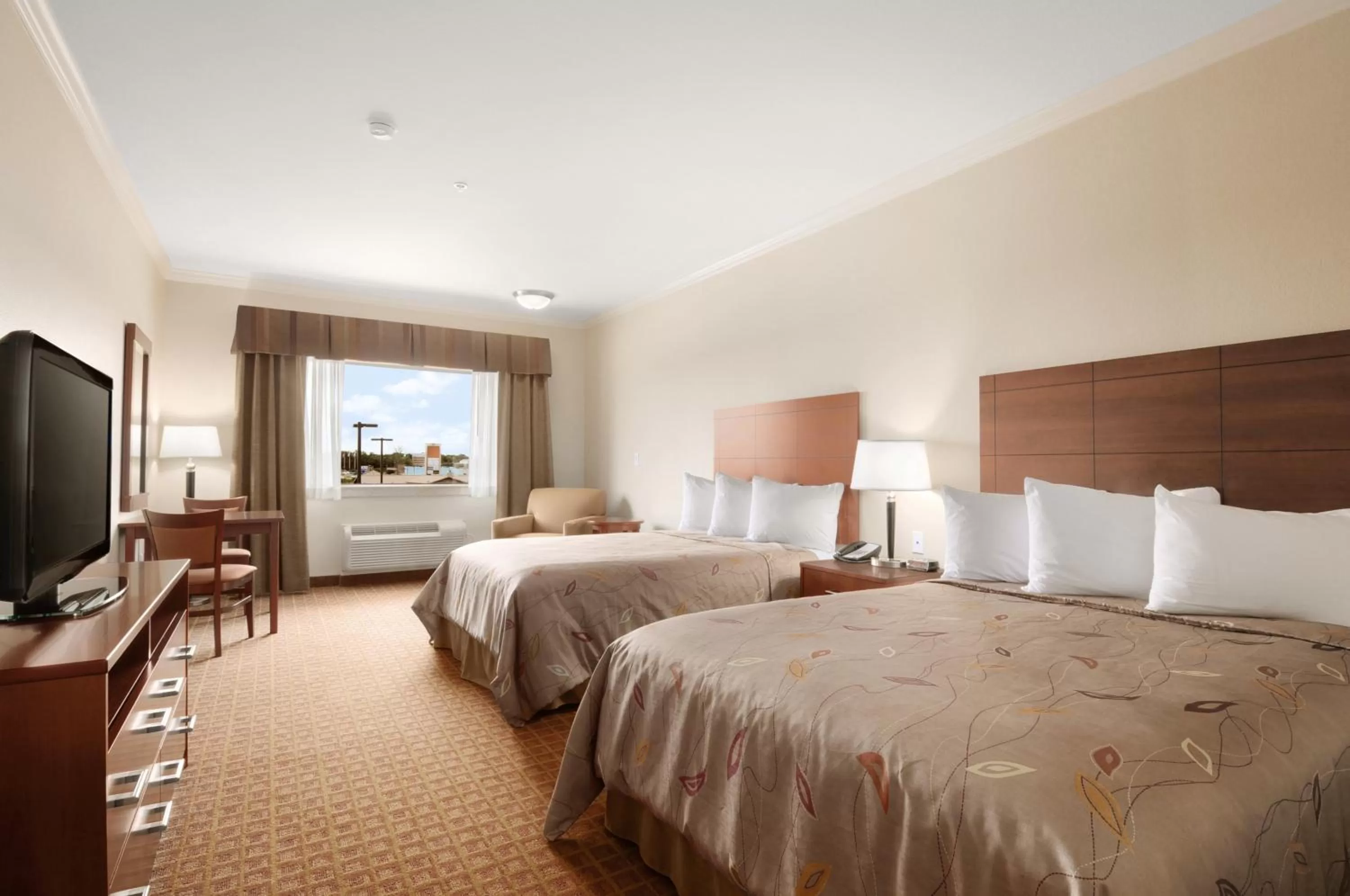 Photo of the whole room, Bed in Ramada by Wyndham College Station