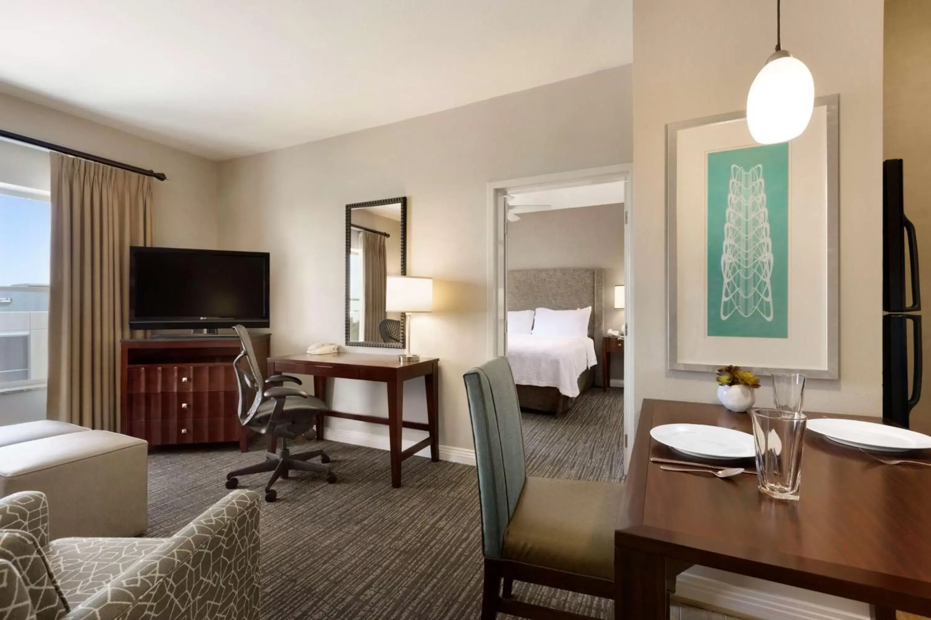 Living room, TV/Entertainment Center in Homewood Suites by Hilton Plano-Richardson