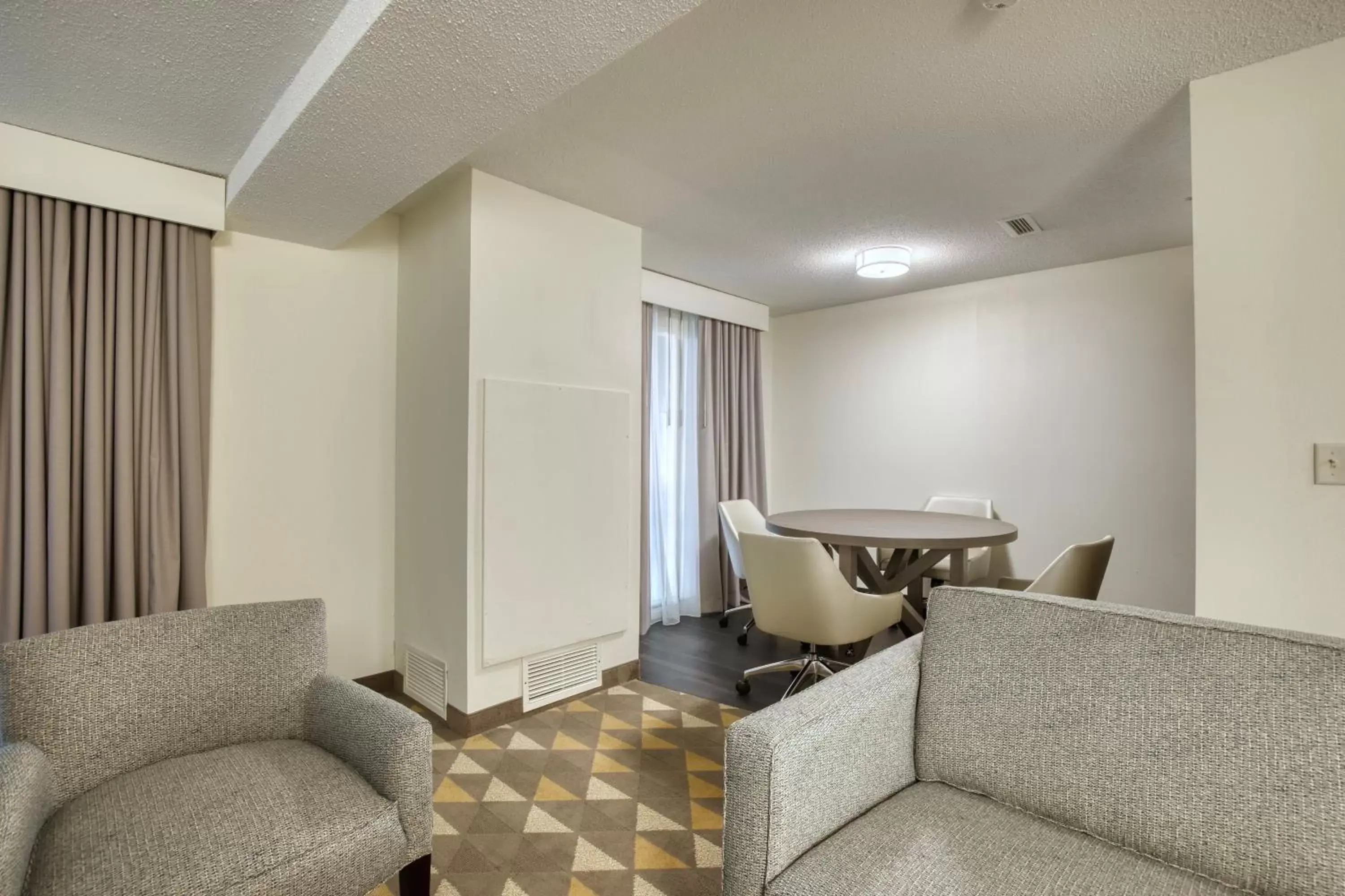 Photo of the whole room, Seating Area in Holiday Inn Hotel & Suites Madison West, an IHG Hotel