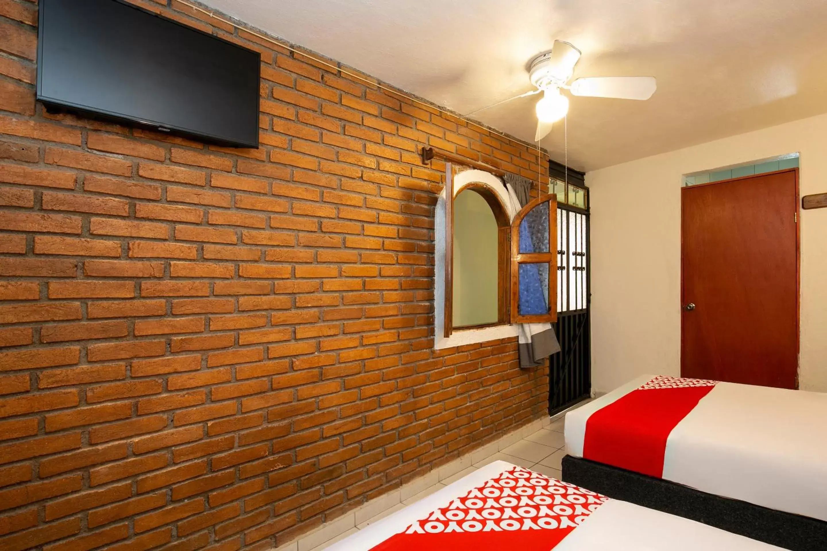 Bedroom in OYO La Casita