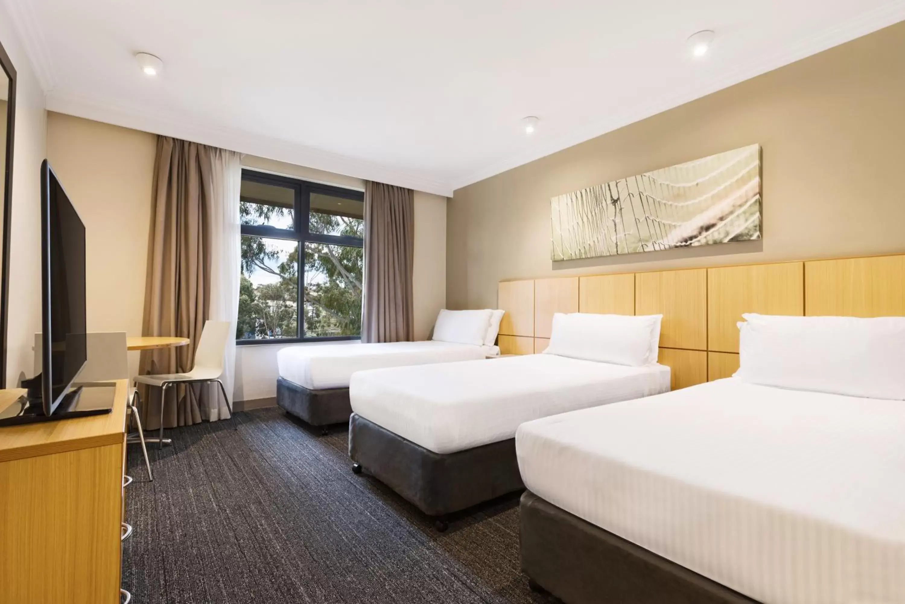 Bed in Mercure Sydney Blacktown