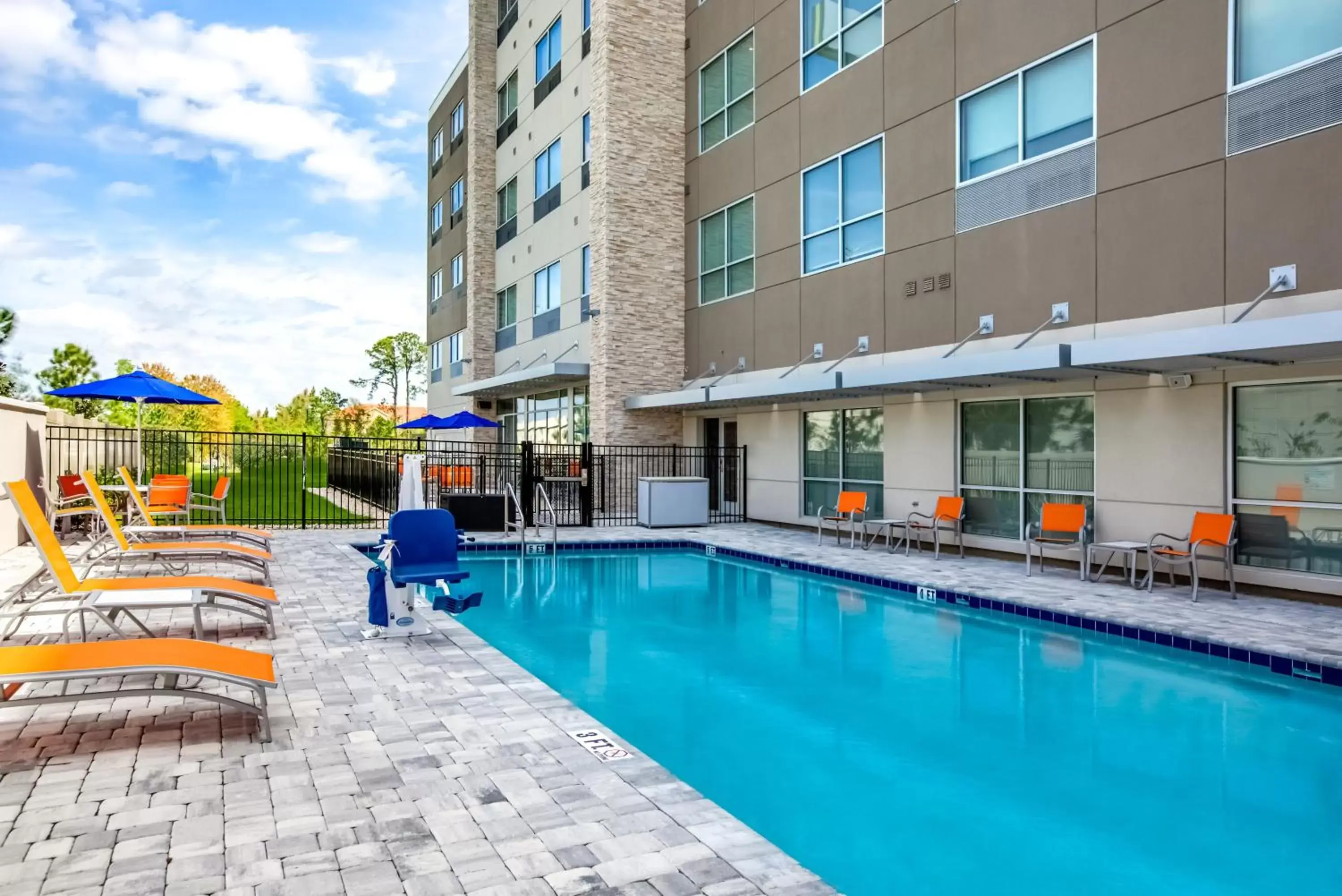 Swimming Pool in Holiday Inn Express & Suites Sanford - Lake Mary, an IHG Hotel