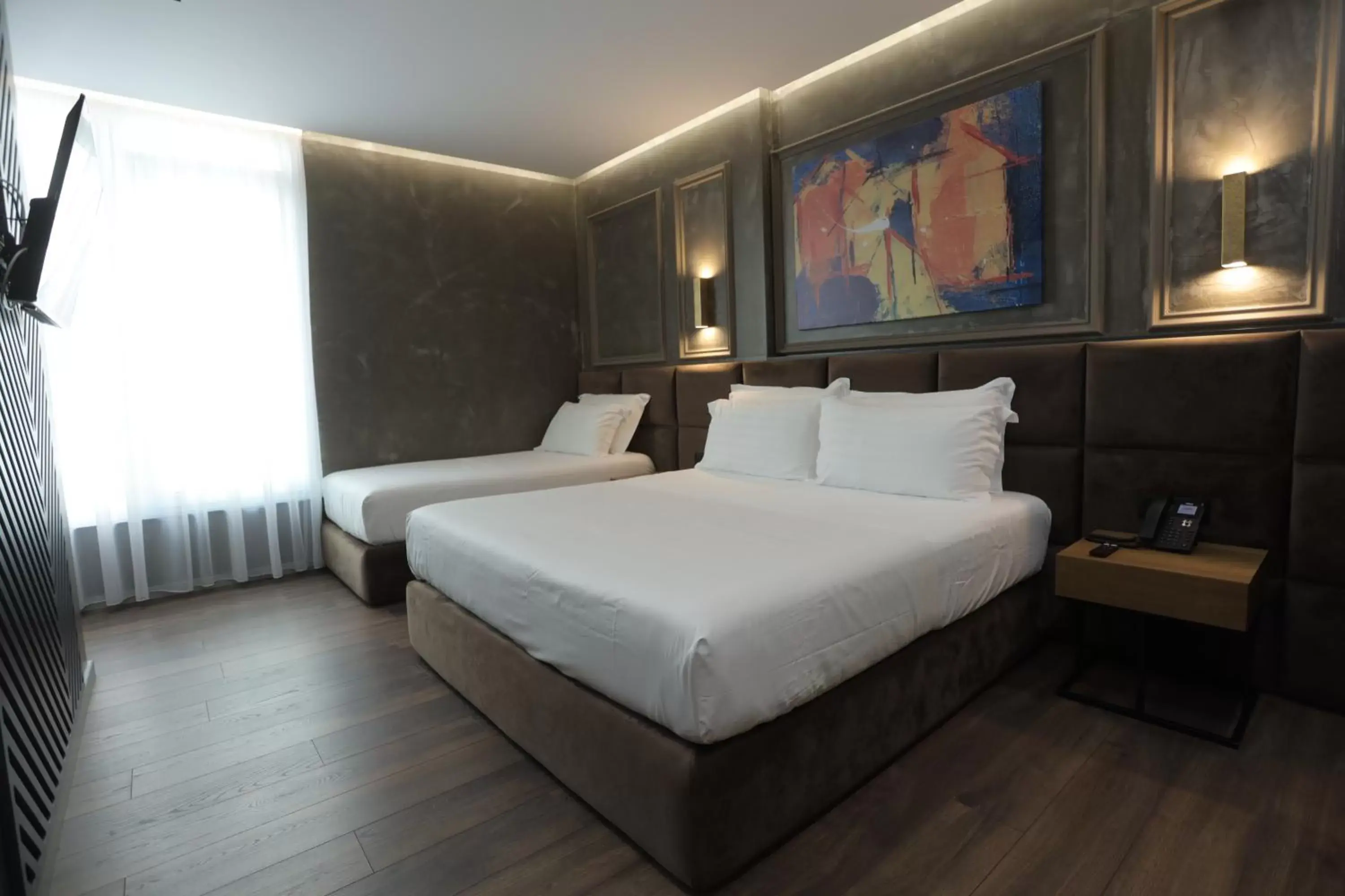 Deluxe Triple Room in AP Hotel Boutique Deluxe Triple Room in AP Hotel Boutique