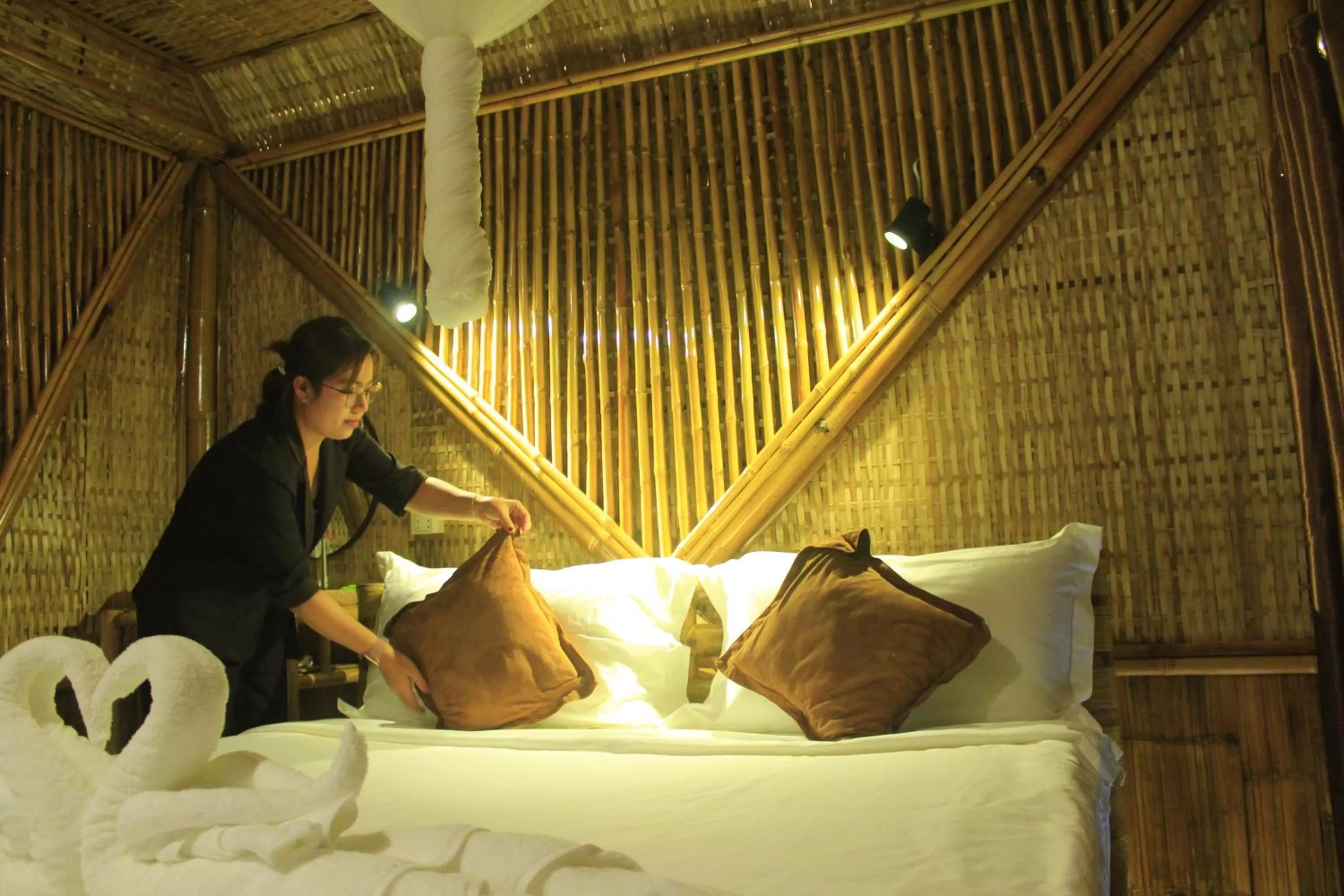 Bed in Hanchey Bamboo Resort
