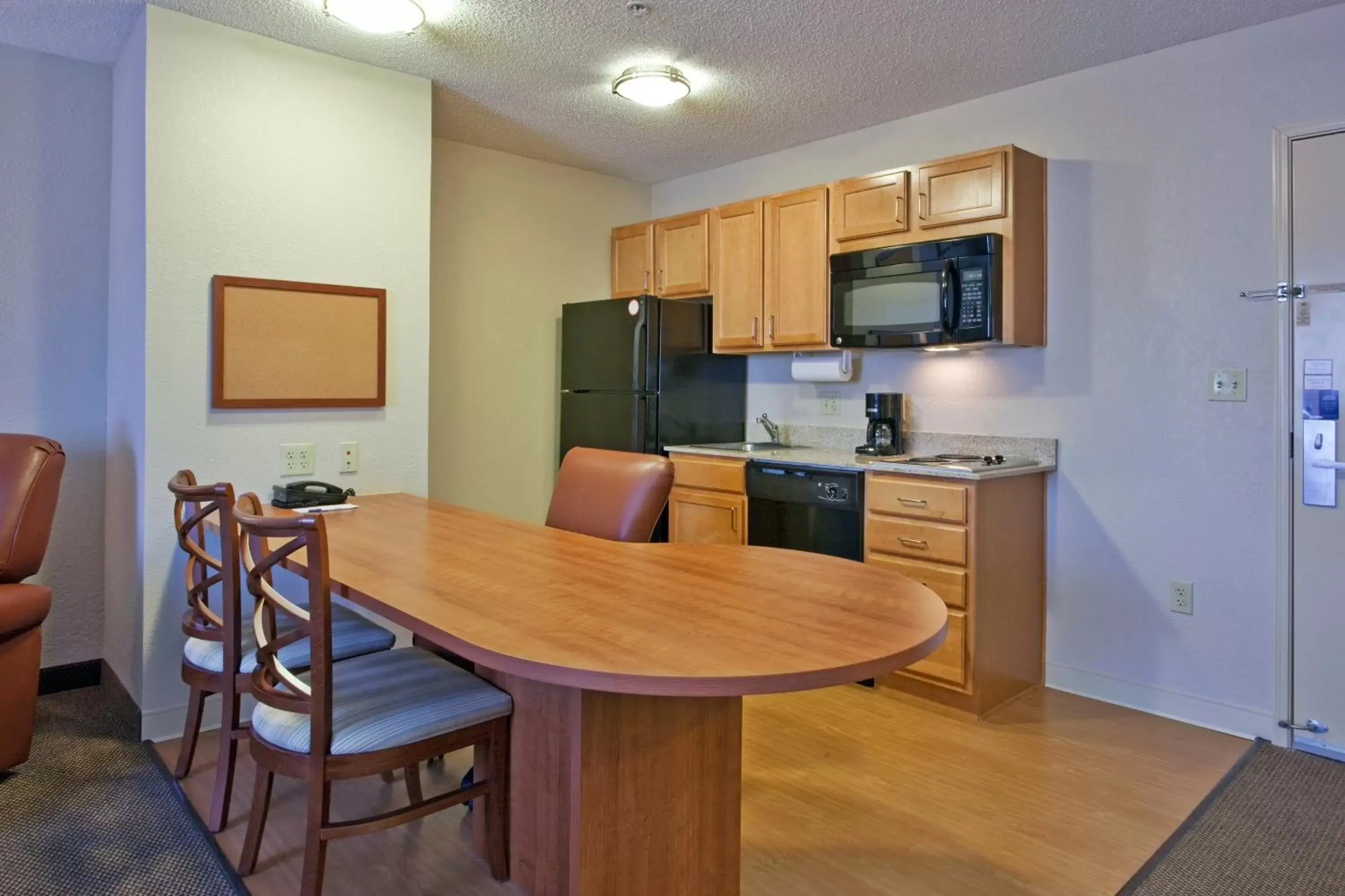 Photo of the whole room, Kitchen/Kitchenette in Candlewood Suites Nogales, an IHG Hotel