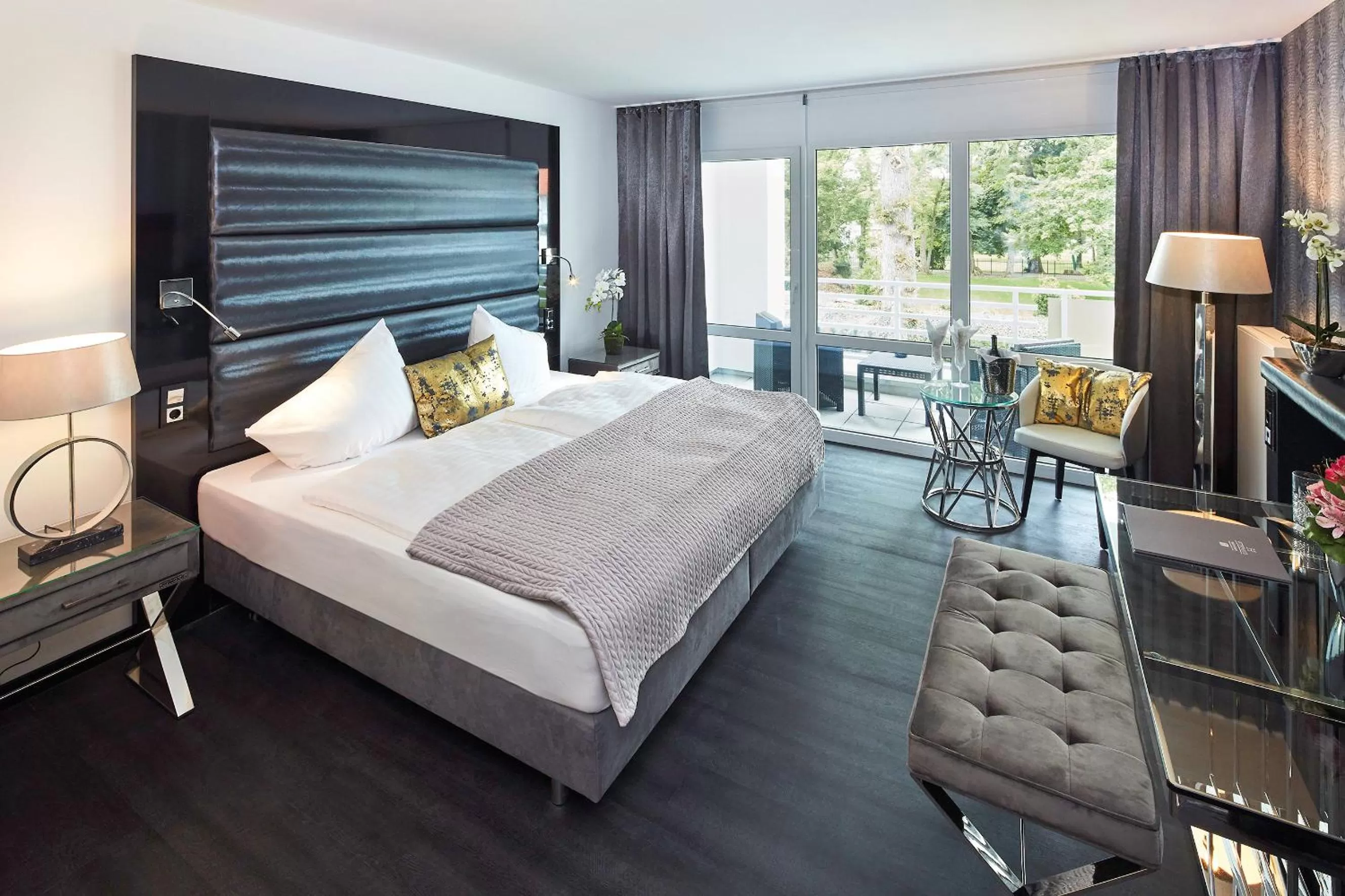 Bed in Kurhaus Design Boutique Hotel