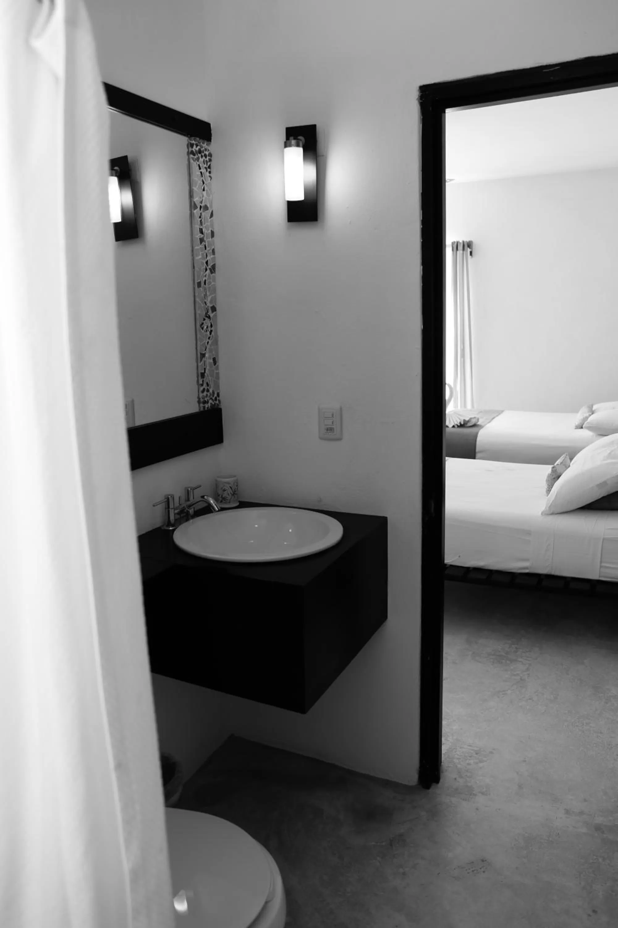Bathroom, Bed in Villas H2O