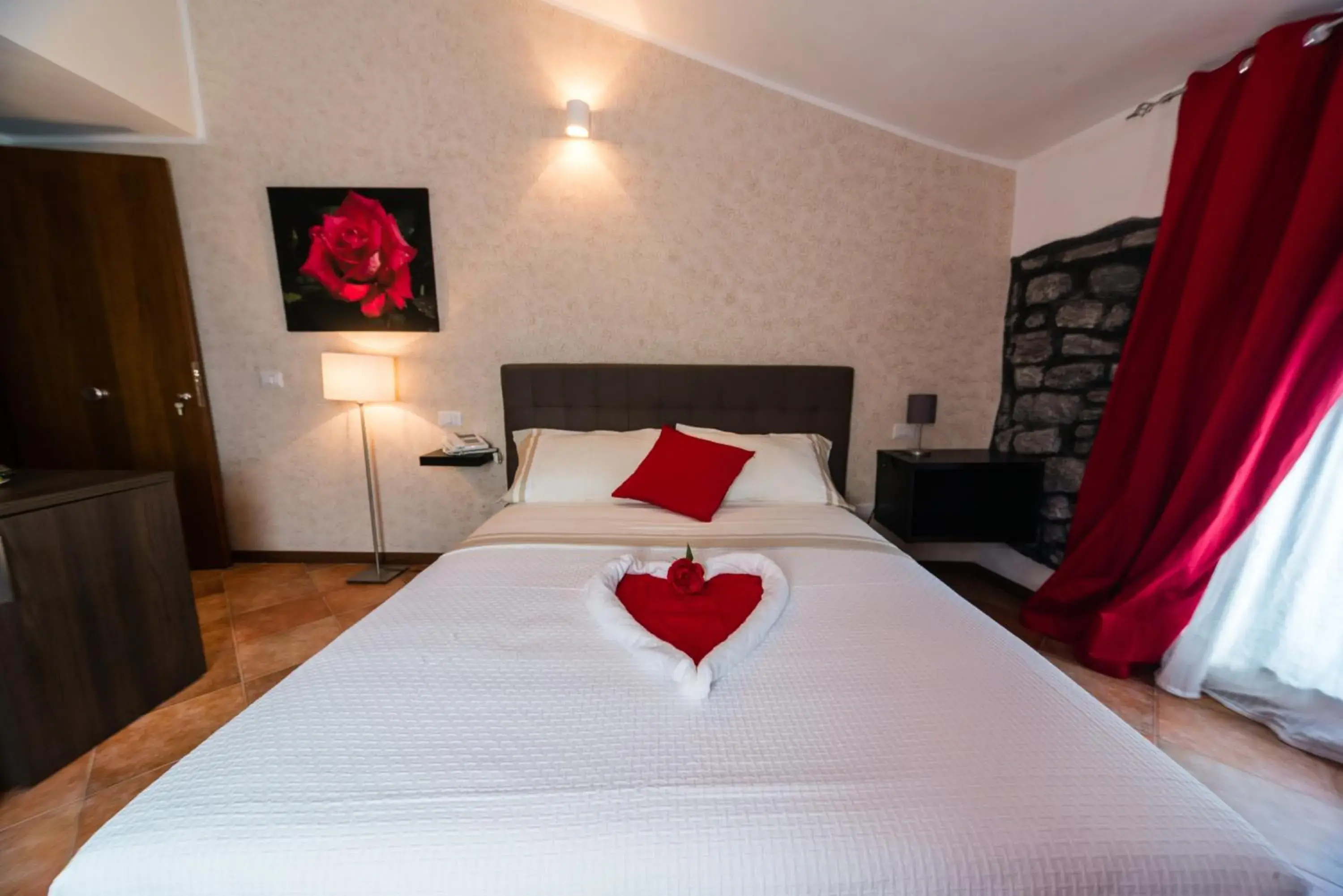 Photo of the whole room, Bed in Le Undici Rose Hotel