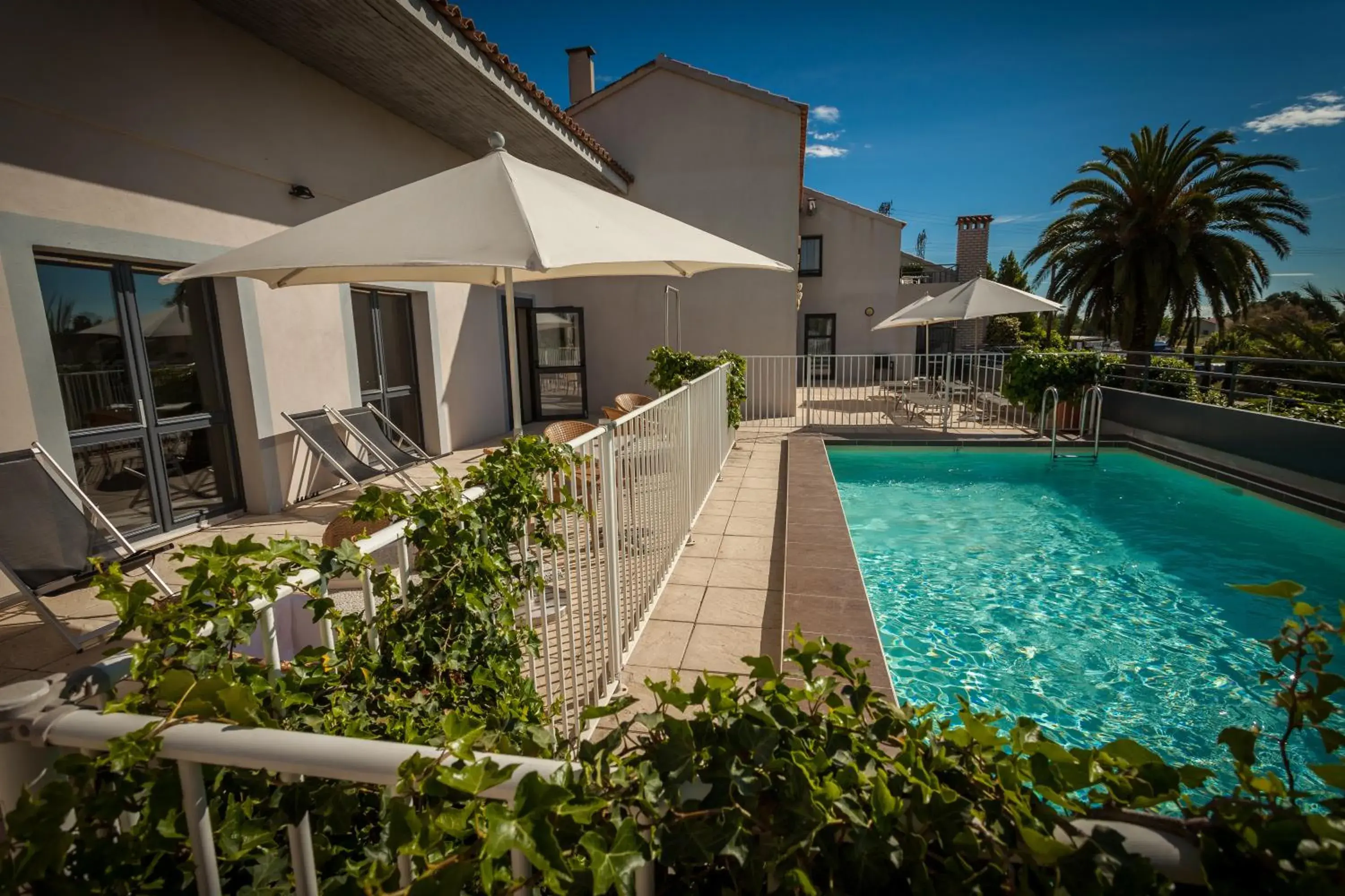 Balcony/Terrace, Swimming Pool in Hotel Canal Aigues Mortes