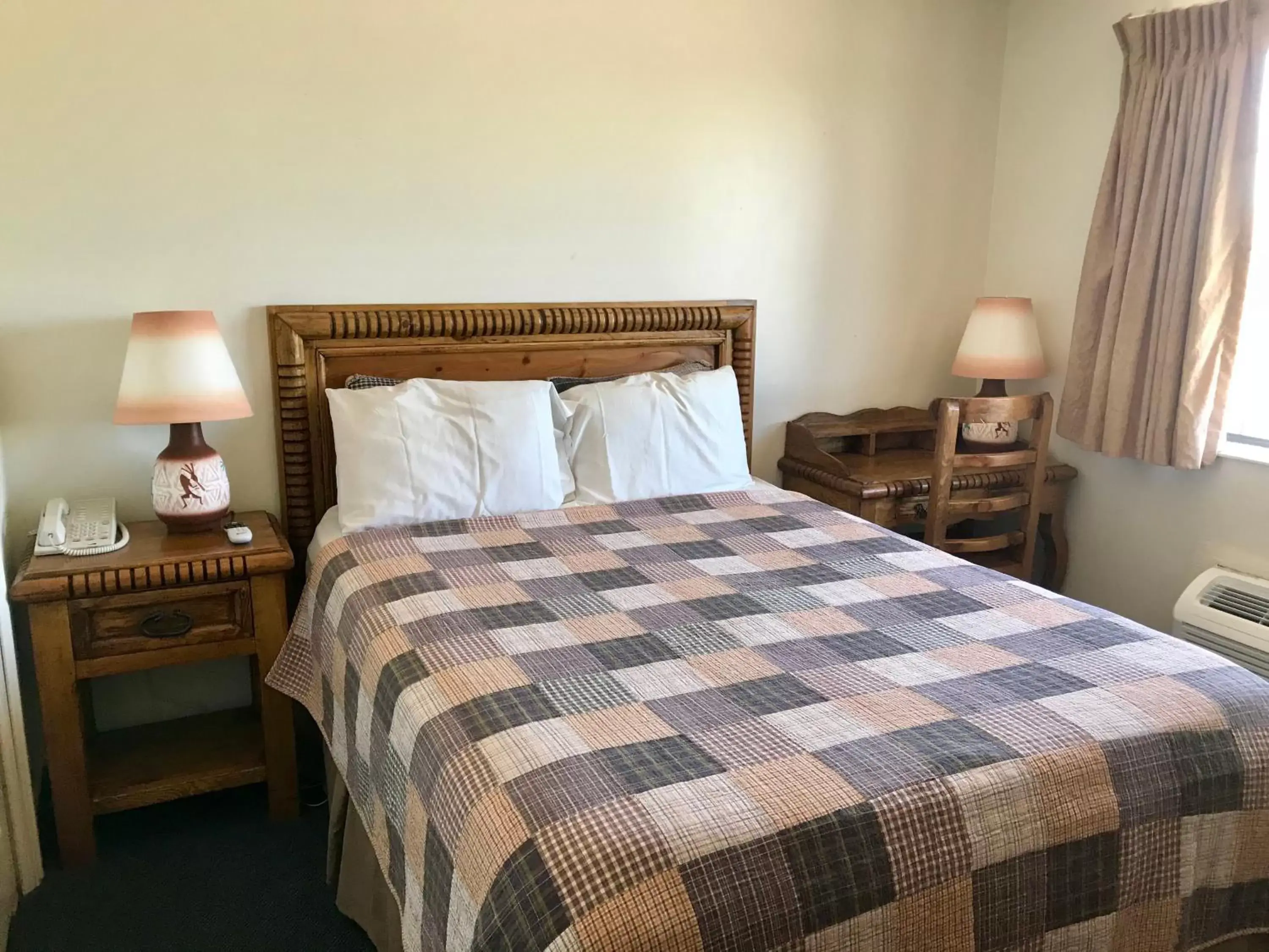 Bed in Four Corners Inn