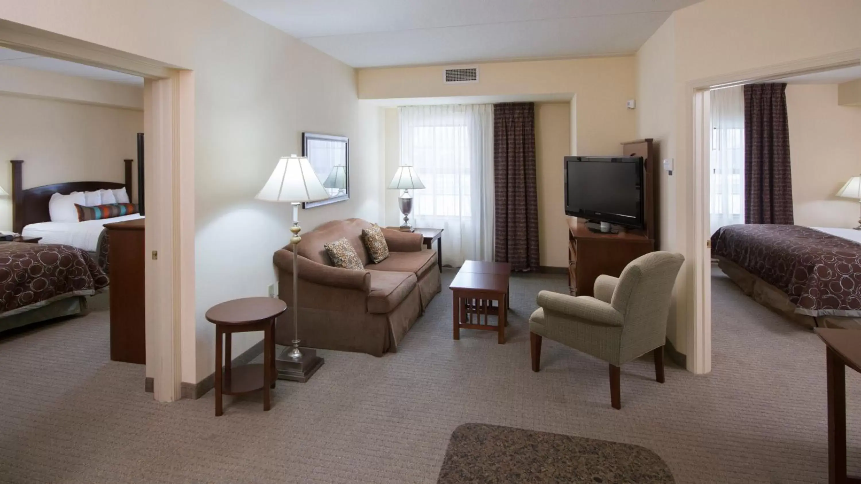 Photo of the whole room, Seating Area in Staybridge Suites Buffalo, an IHG Hotel