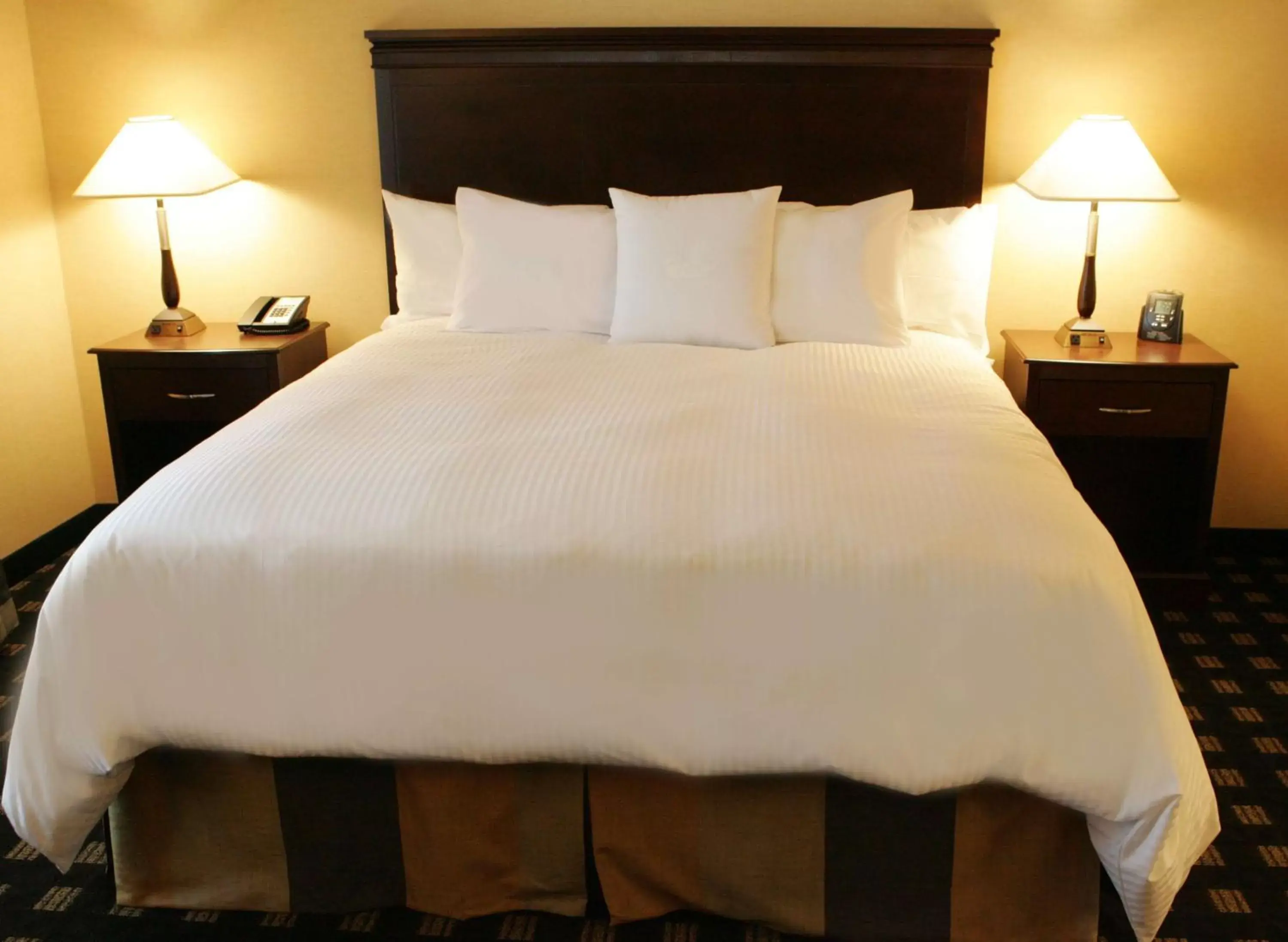 Bed in Homewood Suites by Hilton Toronto Airport Corporate Centre