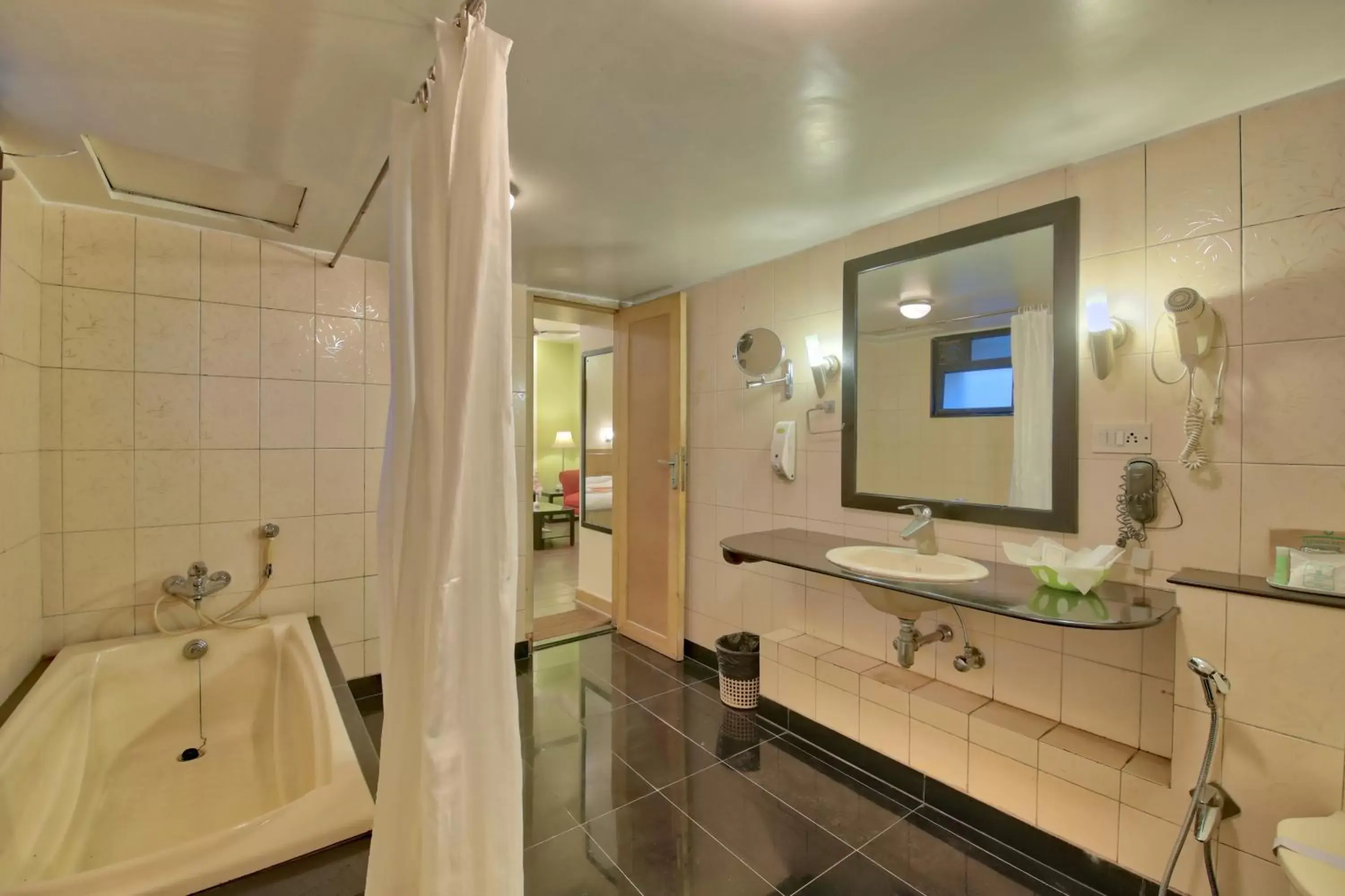 Bathroom in Vishwaratna Hotel