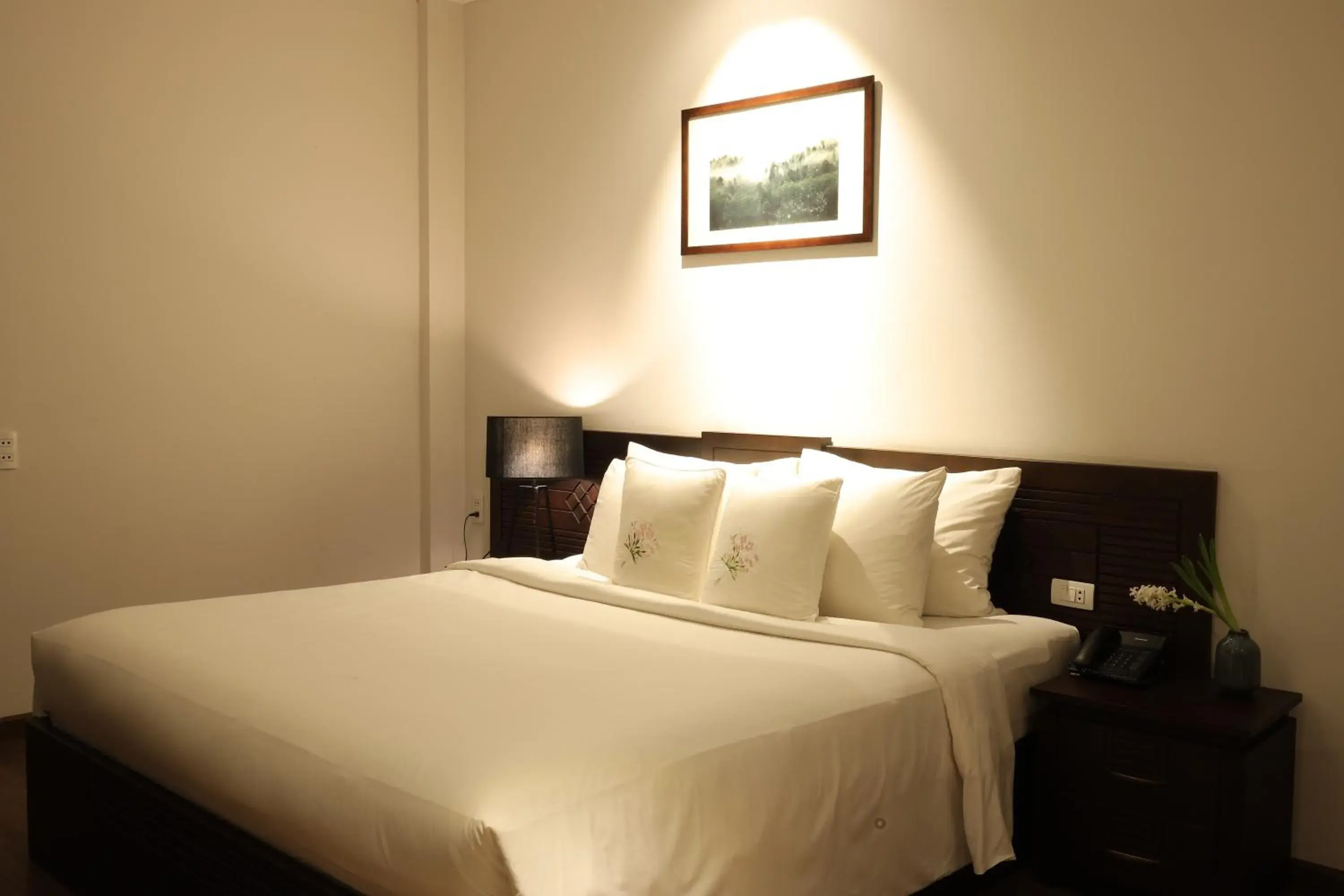 Bed in Cochin Zen Hotel