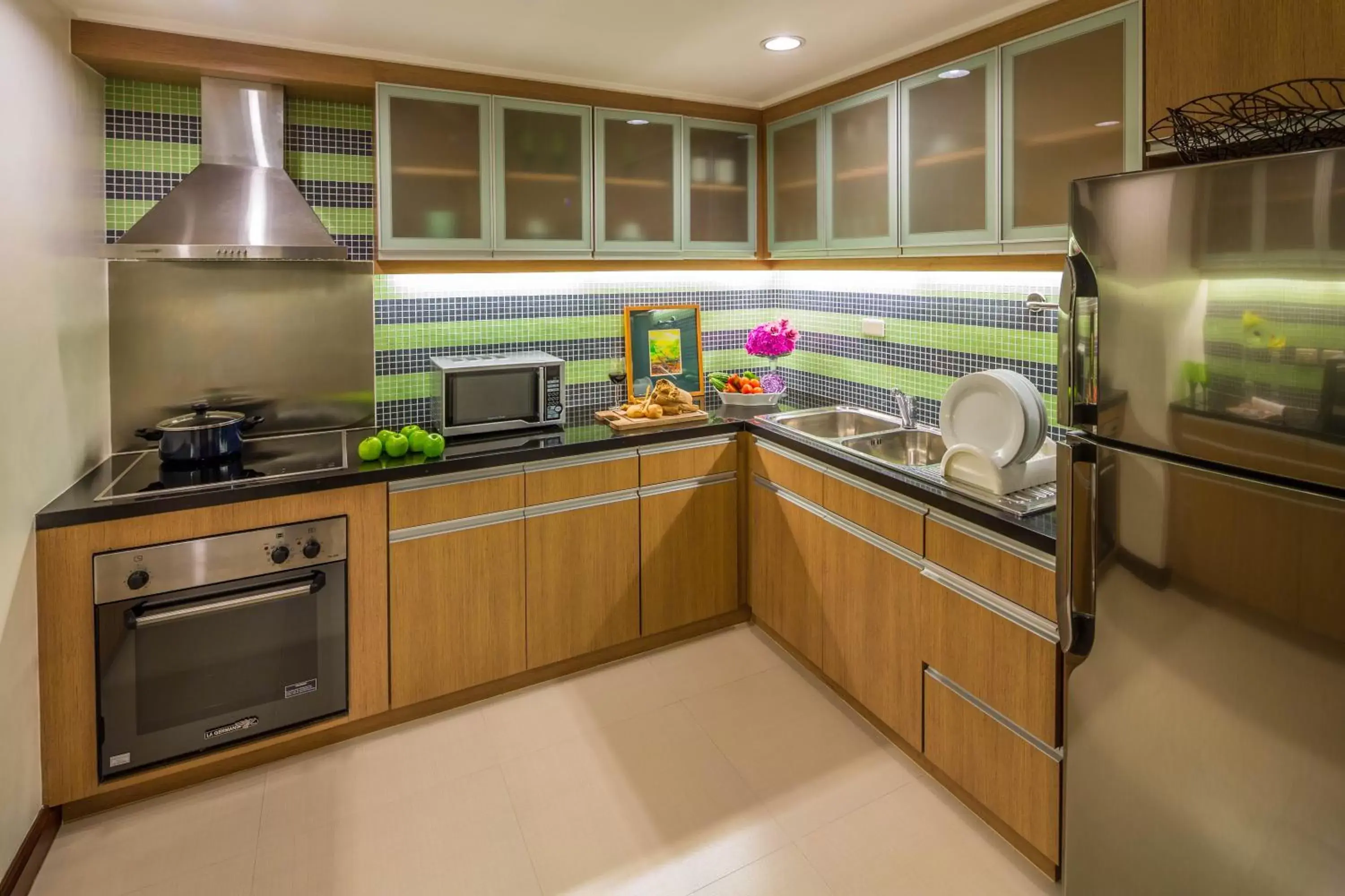 Kitchen or kitchenette, Kitchen/Kitchenette in Discovery Suites Manila, Philippines