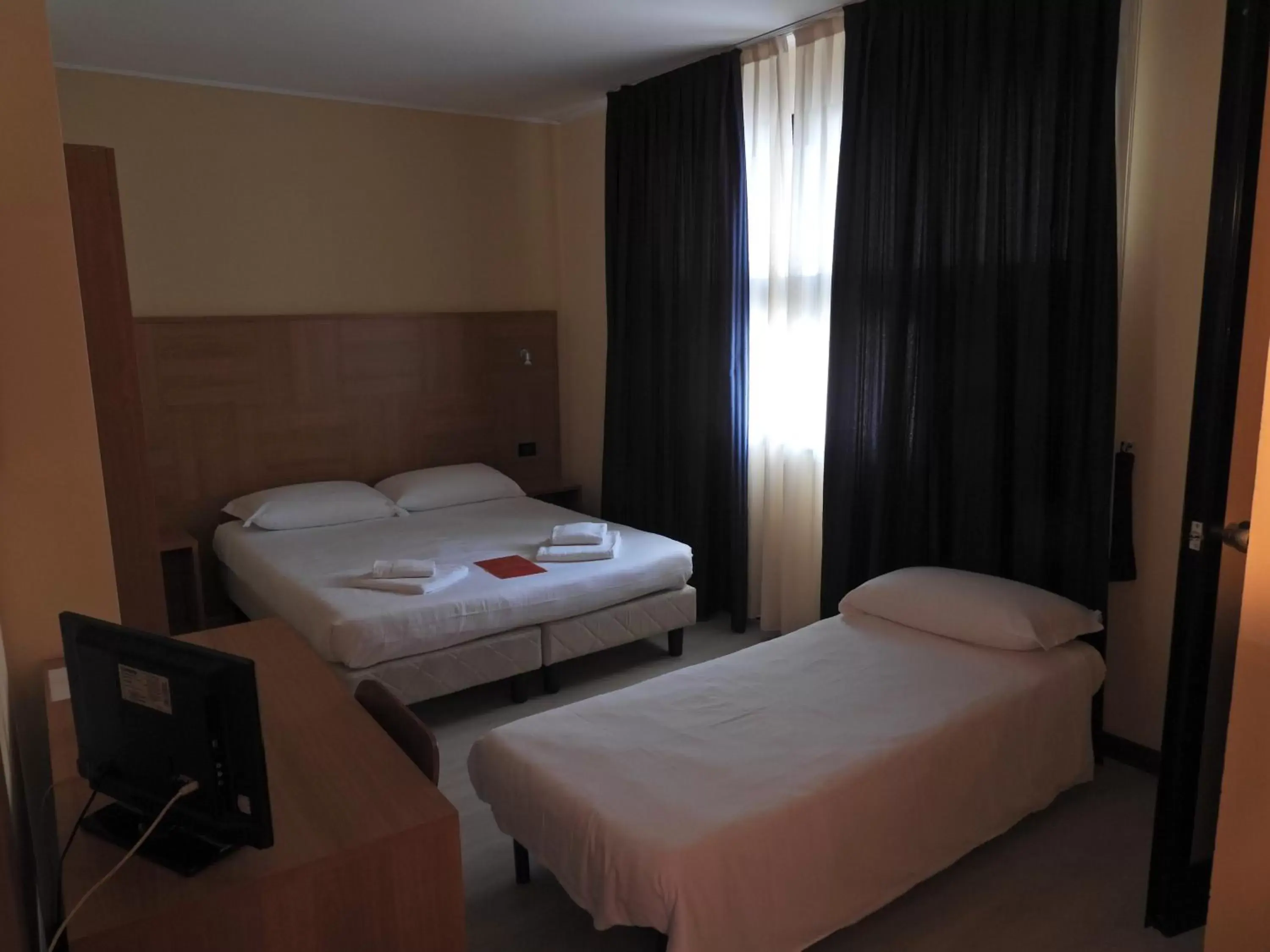 Bed in Hotel Guidi