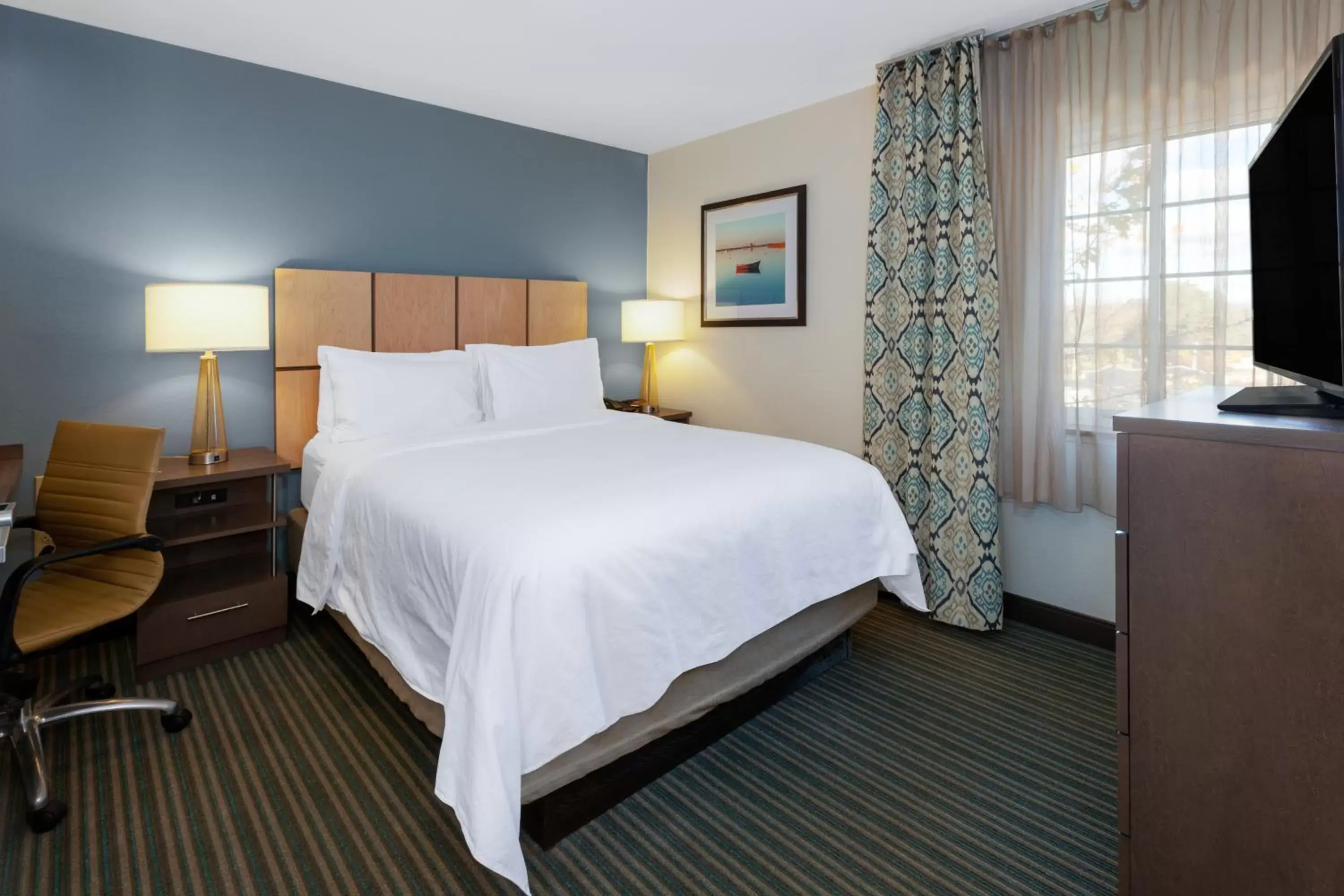 Bed in Candlewood Suites-West Springfield, an IHG Hotel