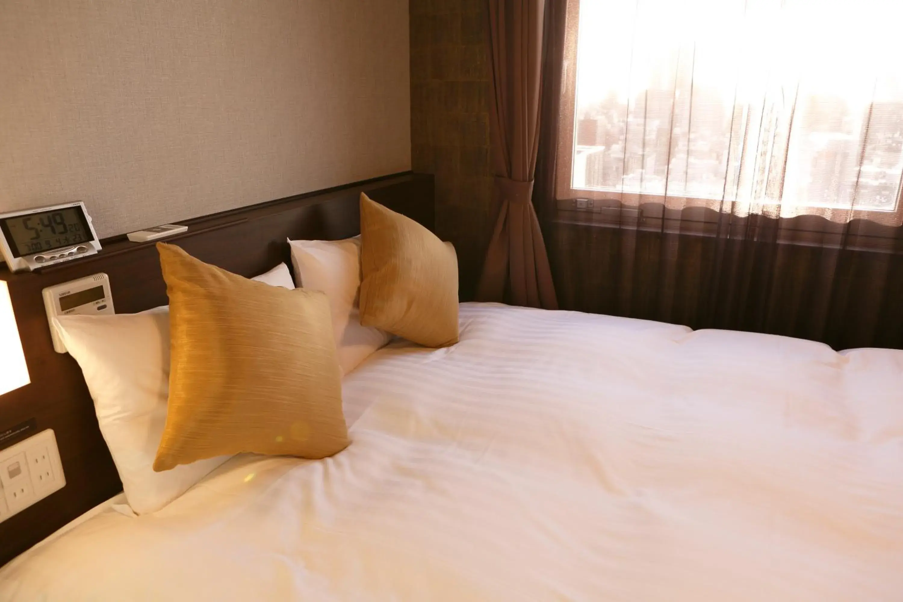 Bed in Dormy Inn Premium Namba Natural Hot Spring