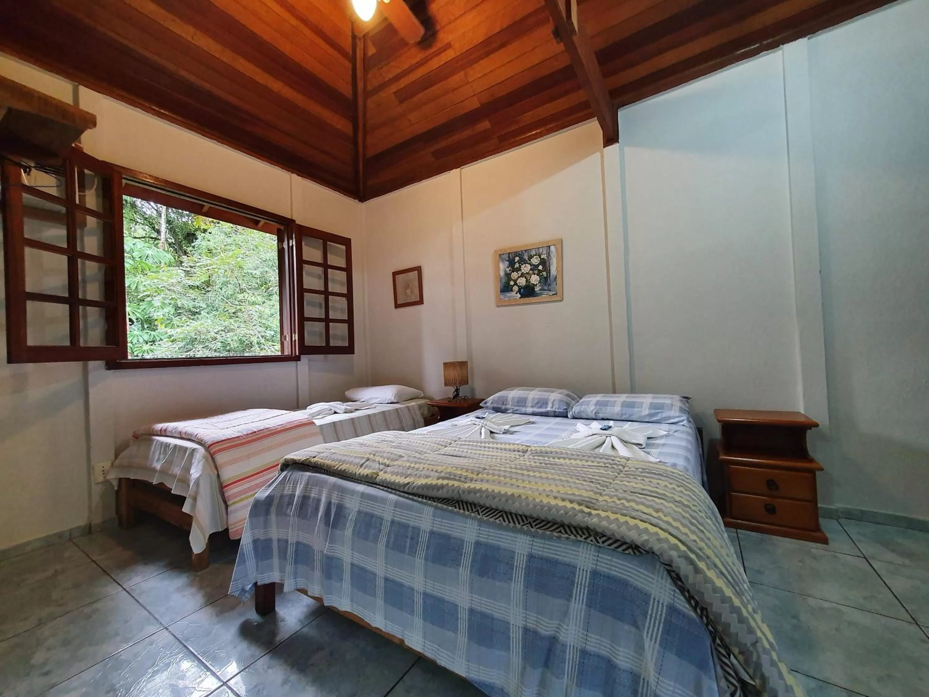 Bed in Pousada Canto do Curió Paraty