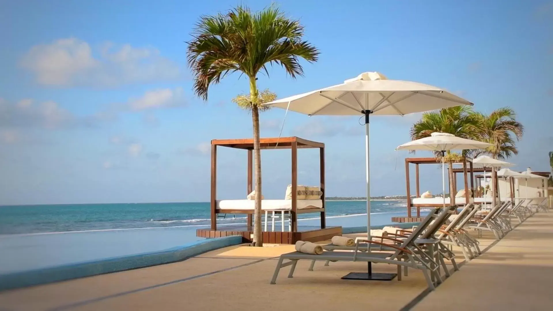 Swimming pool in Senses Riviera Maya - Ocean Front Boutique Hotel - Adults only Swimming pool in Senses Riviera Maya - Ocean Front Boutique Hotel - Adults only