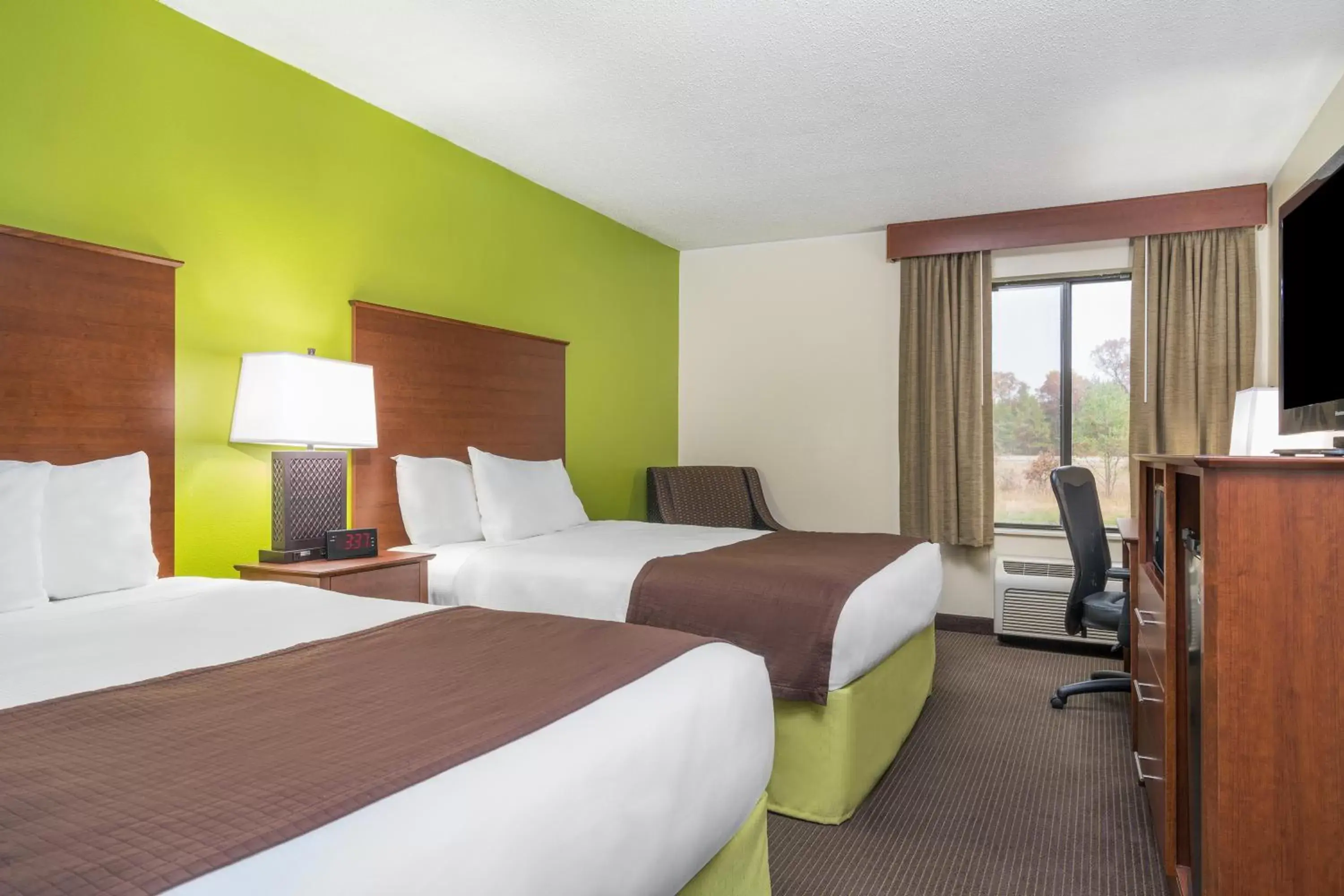 Photo of the whole room, Bed in AmericInn by Wyndham Black River Falls I-94 on ATV Trail