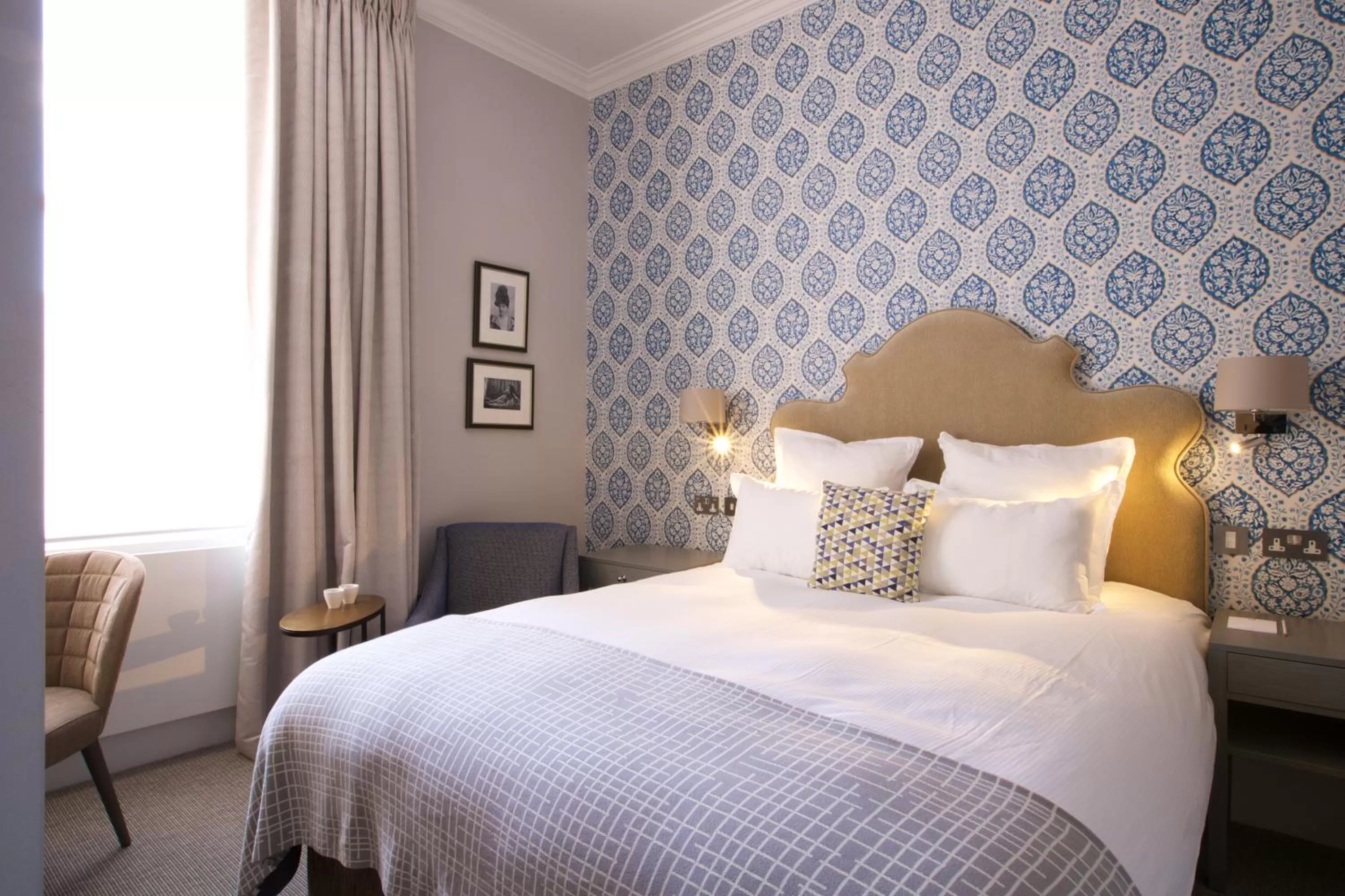 Bed in 54 Queen's Gate Hotel