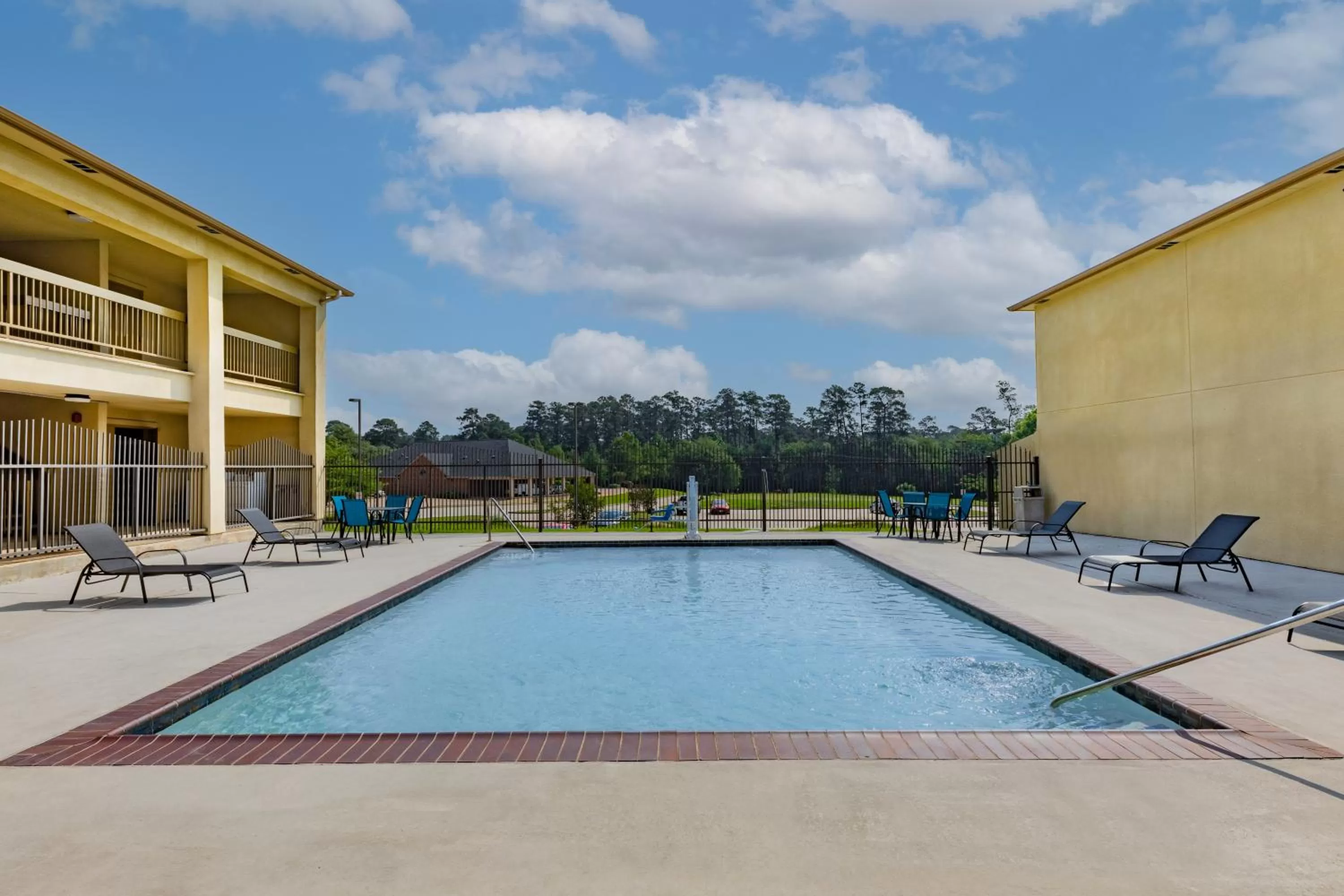 Swimming pool in Days Inn & Suites by Wyndham Huntsville
